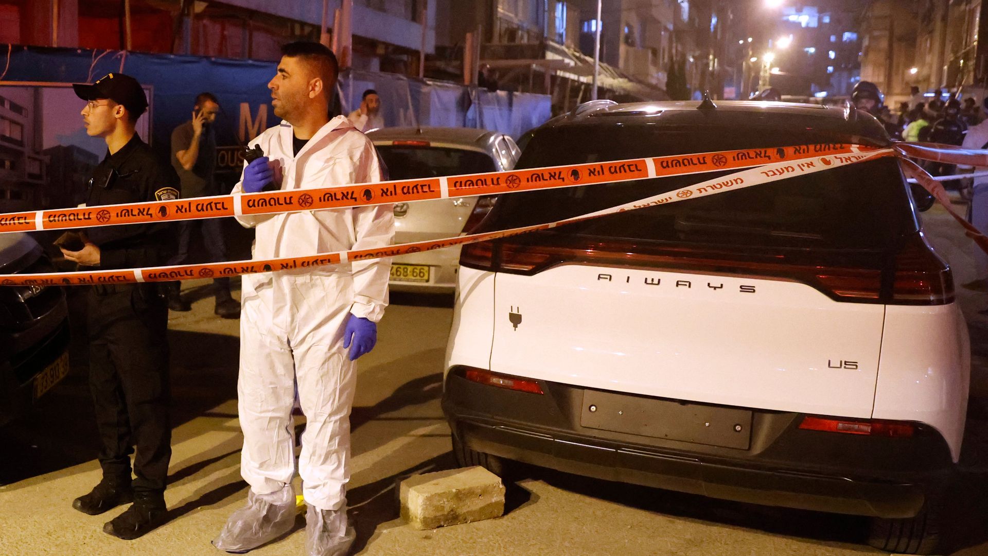 Israeli security forces gather at the scene of an attack on March 29, 2022 in Bnei Brak