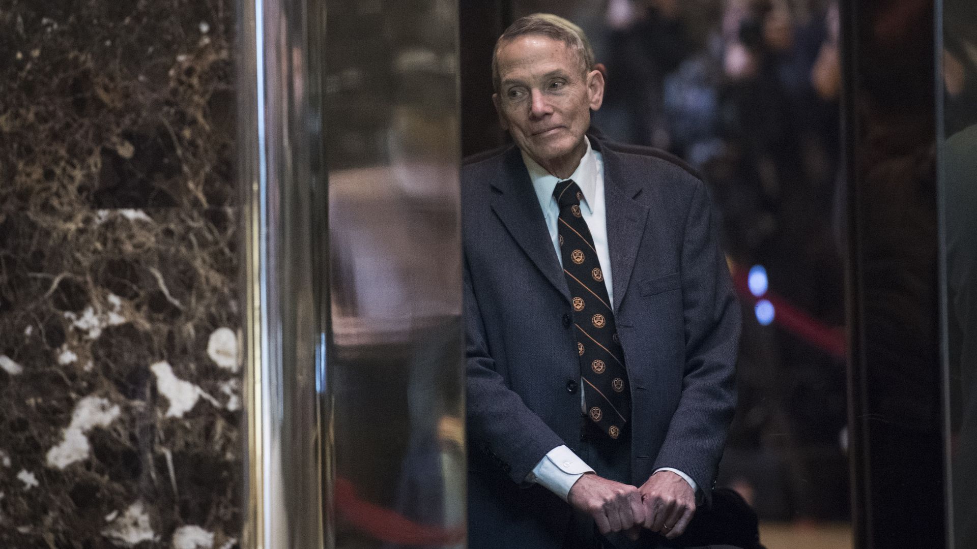 Physicist William Happer arrives in the lobby of Trump Tower in New York, N.Y.