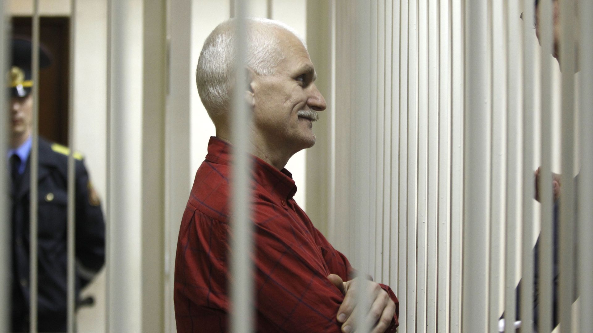 Ales Bialiatski in a cage during a court session in Minsk, Belarus, in 2011.