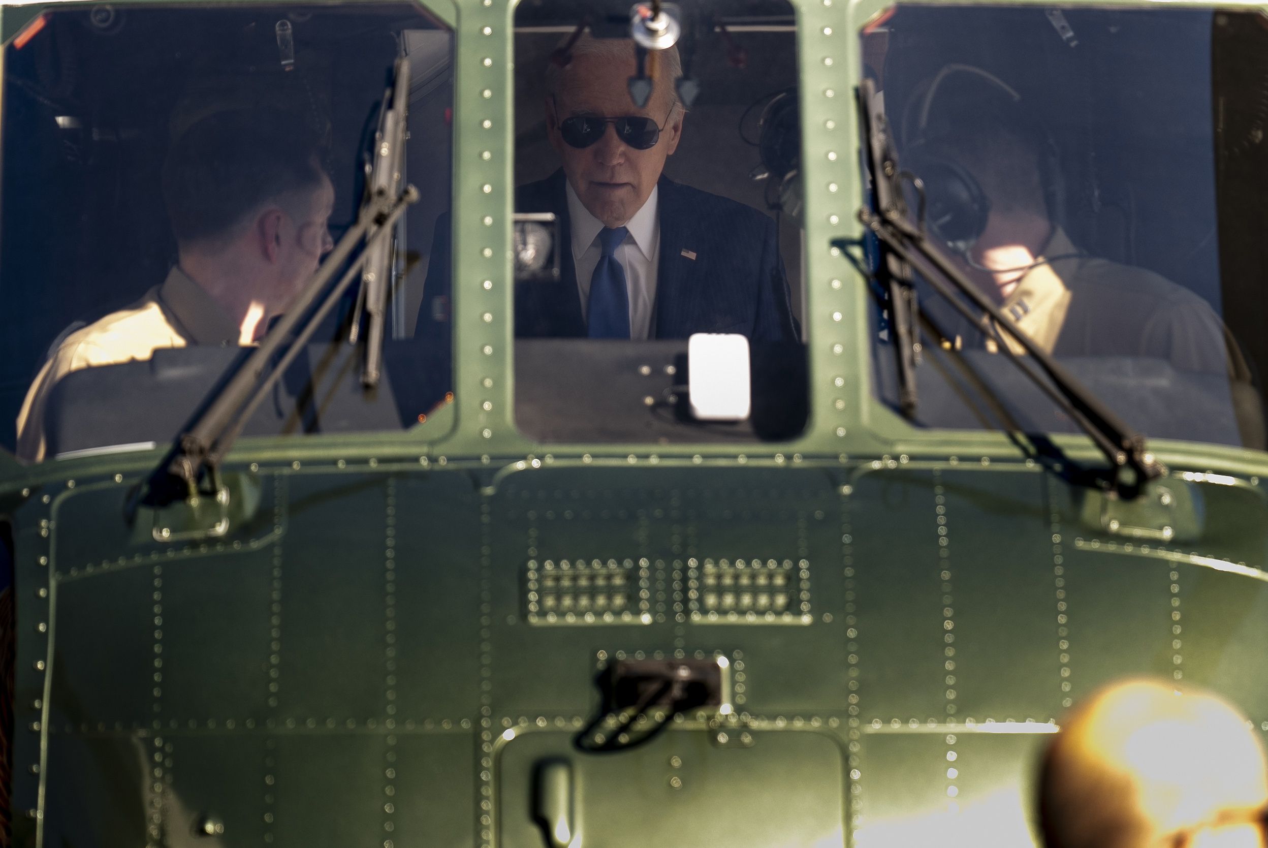 President Biden speaks to Marine One pilots as he arrives at a Wall Street heliport on Feb. 7 to attend fundraisers. 
