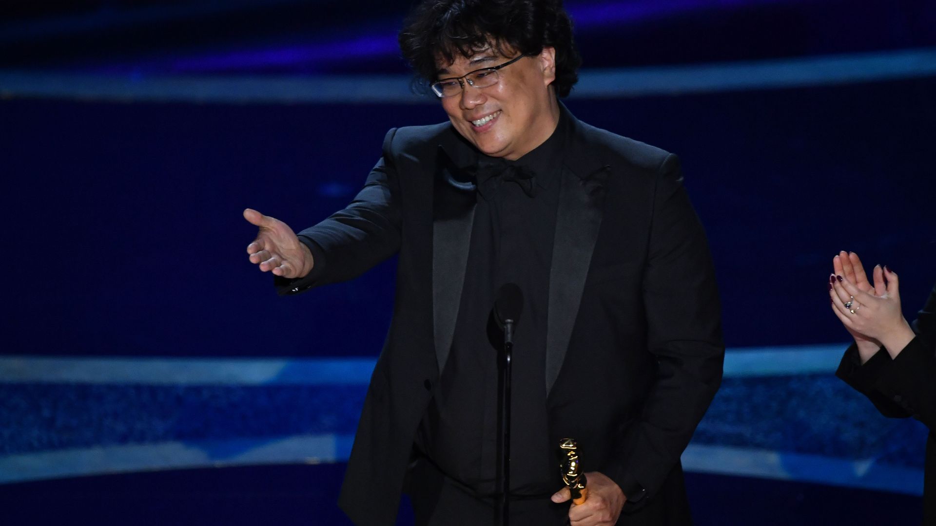 Bong Joon Ho accepts the award for Best Director for "Parasite" during the 92nd Oscars at the Dolby Theatre in Hollywood, California on February 9, 2020.