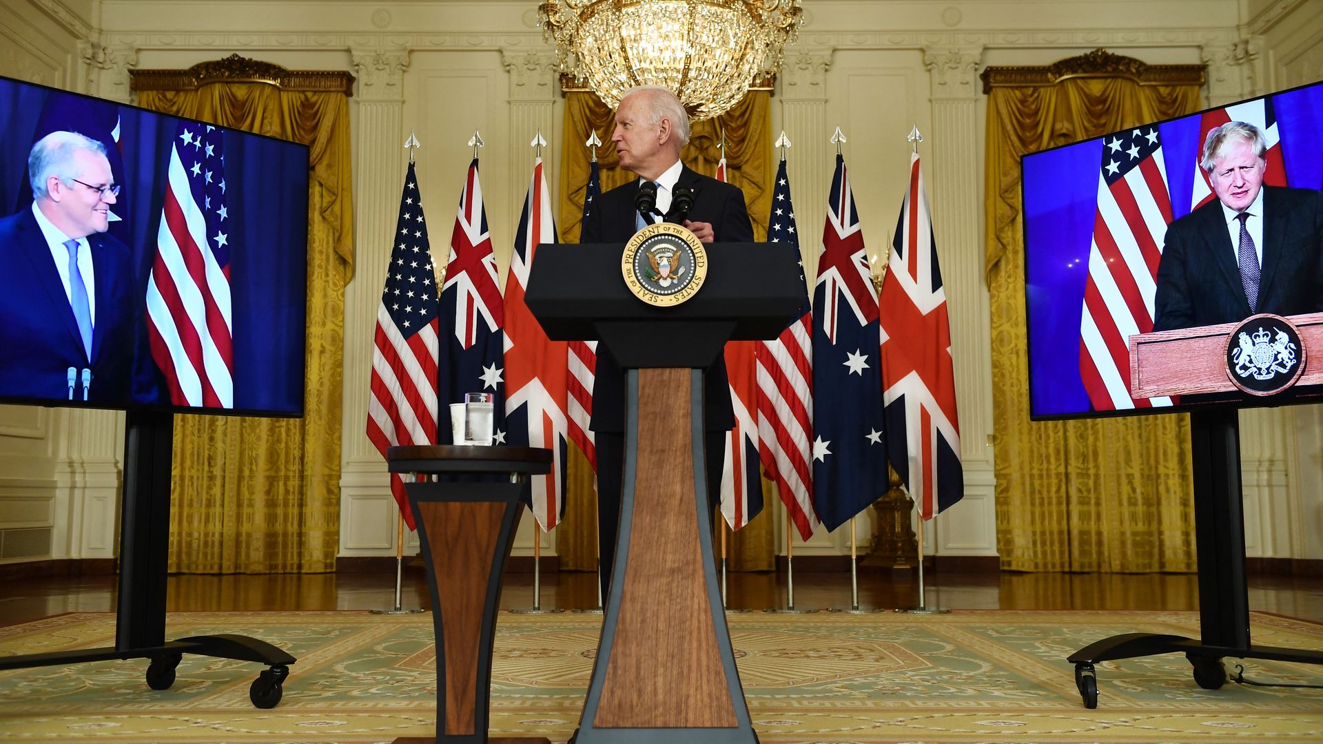 President Biden is seen looking at Australia Prime Minister Scott Morrison during press statements with British Prime Minister Boris Johnson.