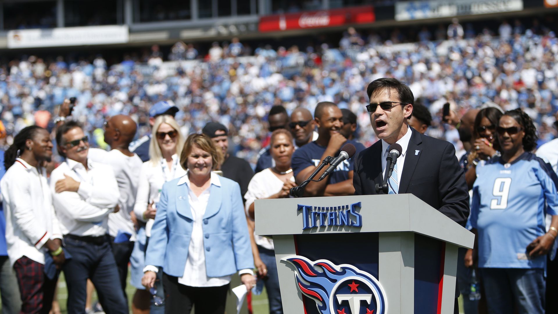 Mike Keith emcees the ceremony to retire the jersey numbers of Eddie George and Steve McNair in 2019.