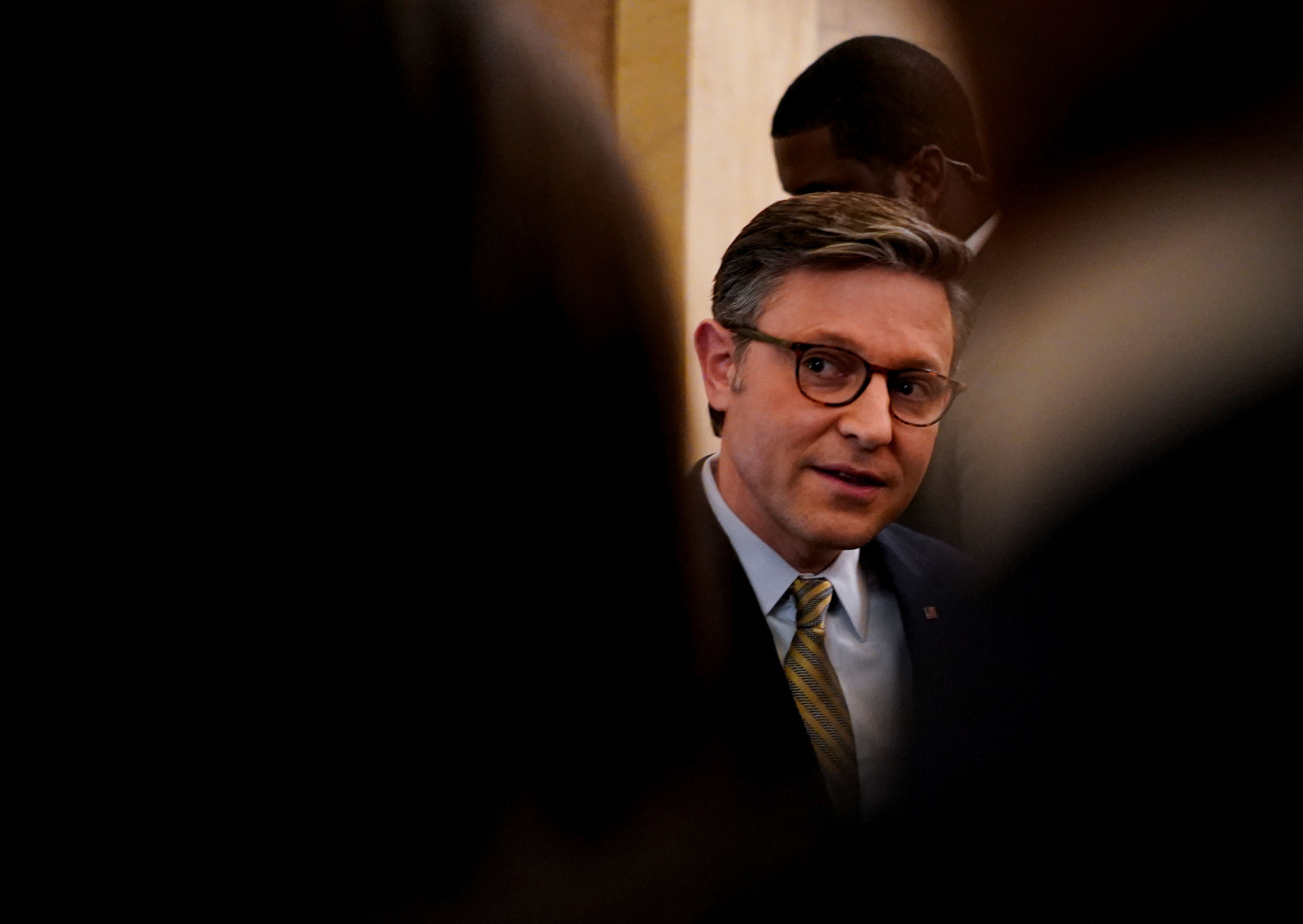 Speaker Mike Johnson (R-La.) speaks after the passage of a spending bill to avert a government shutdown on Friday.
