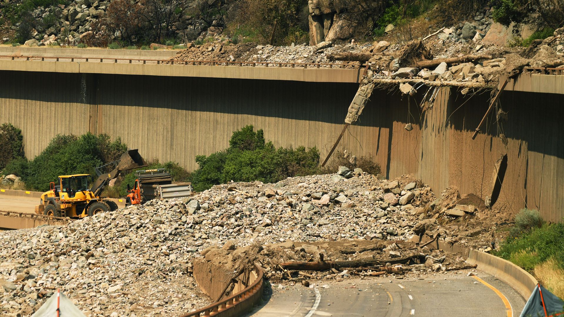 Crews work to reopen Interstate 70 through Glenwood Canyon after a mudslide in August. Photo: RJ Sangosti/The Denver Post via Getty Images