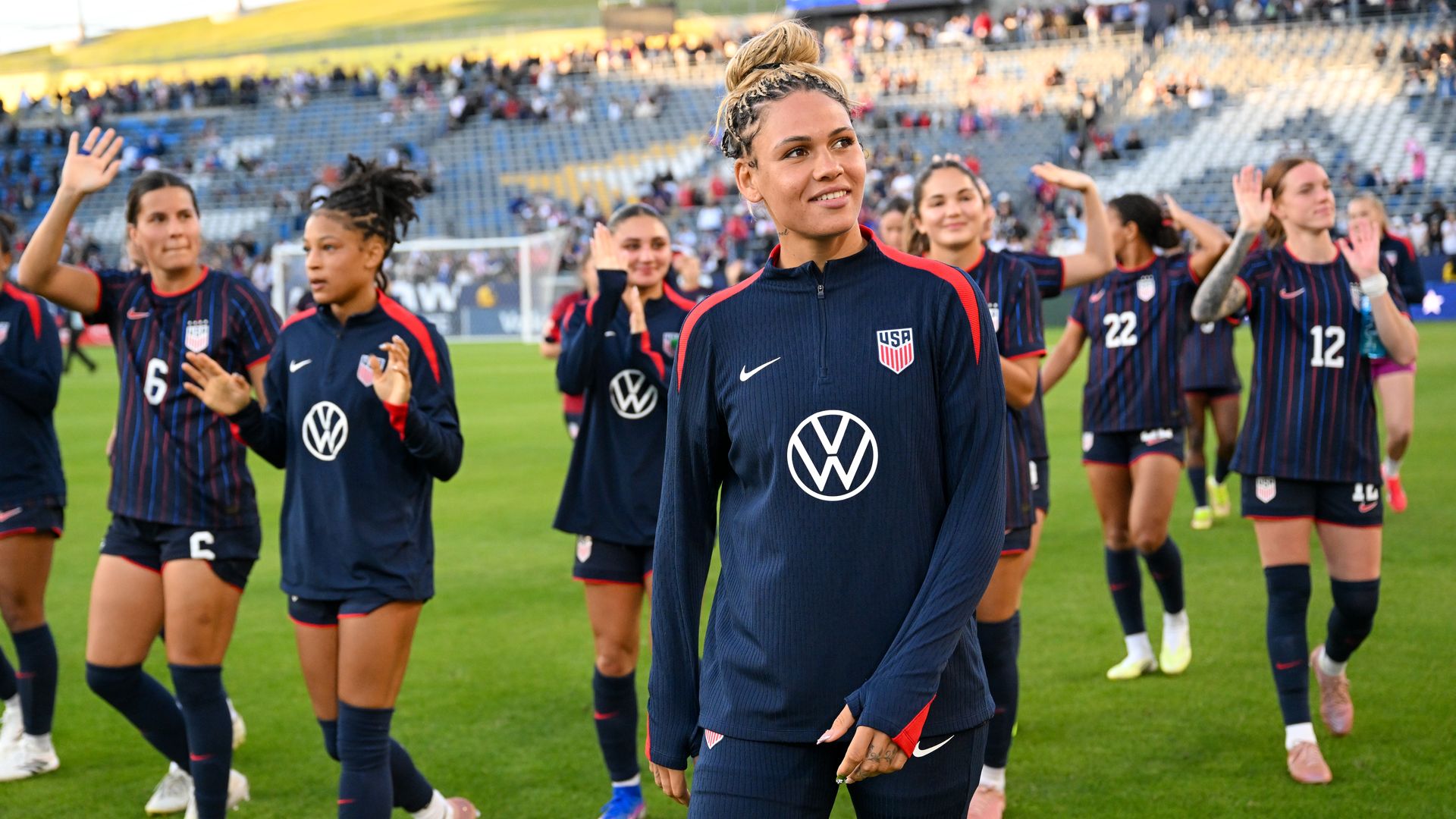 Trinity Rodman wearing a Team USA zip-up on the pitch for an international friendly match against Paraguay.