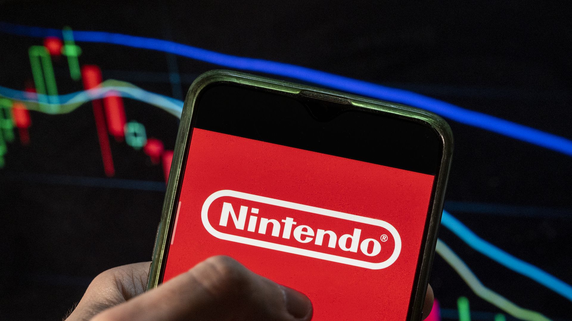 The Nintendo logo is seen on a mobile device.