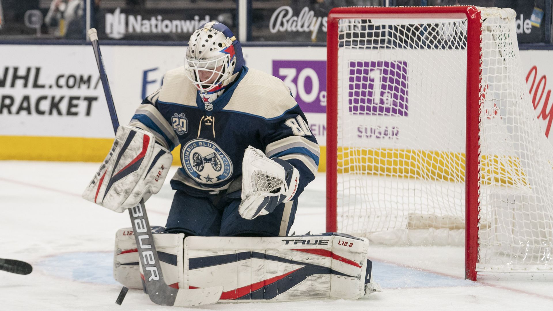 Matiss Kivlenieks deflecting a shot during a game between the Columbus Blue Jackets and the Detroit Red Wings in Columbus, Ohio, in May.