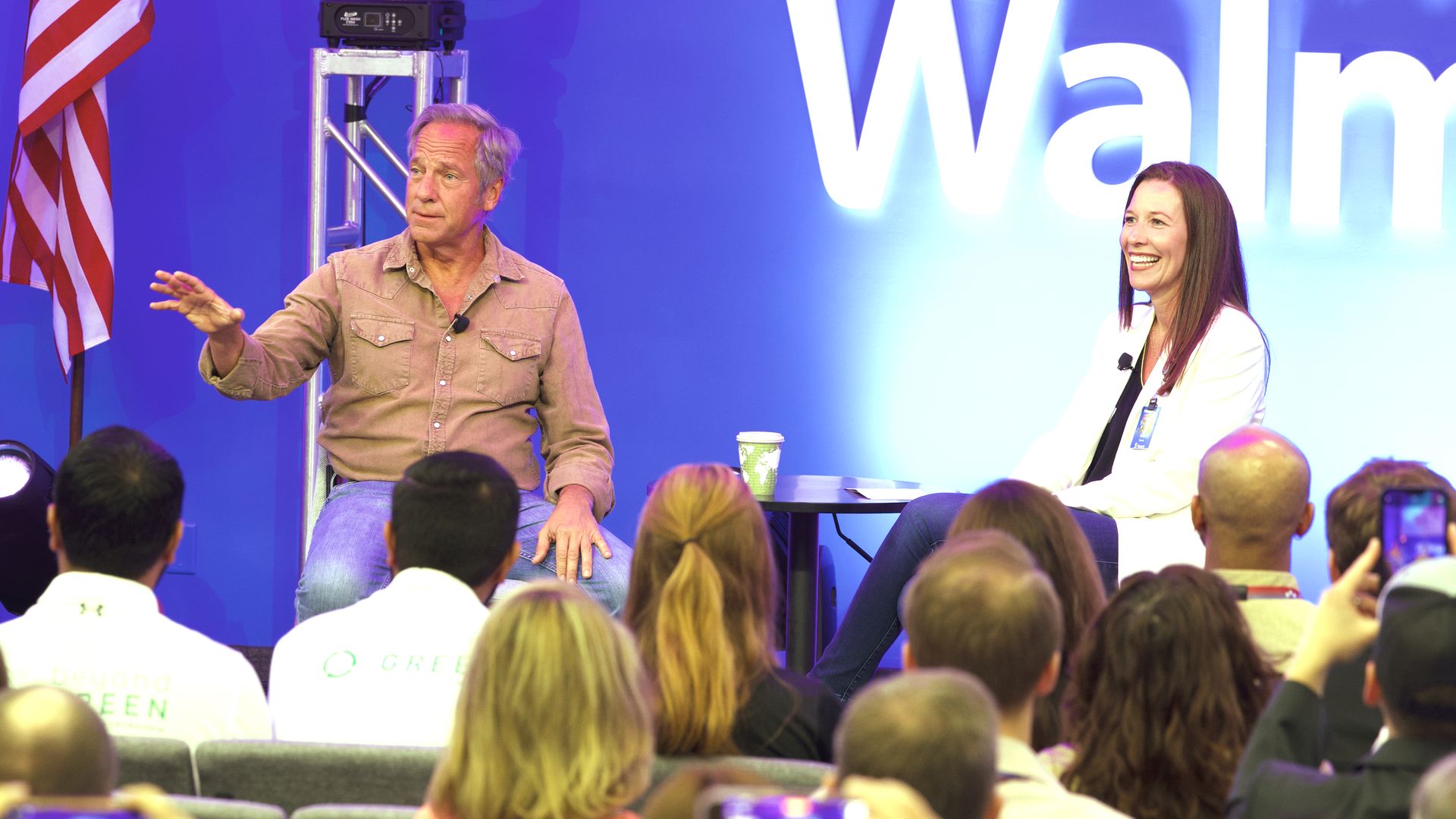 Television star Mike Rowe talks with Kathryn McLay, CEO of Walmart International. 