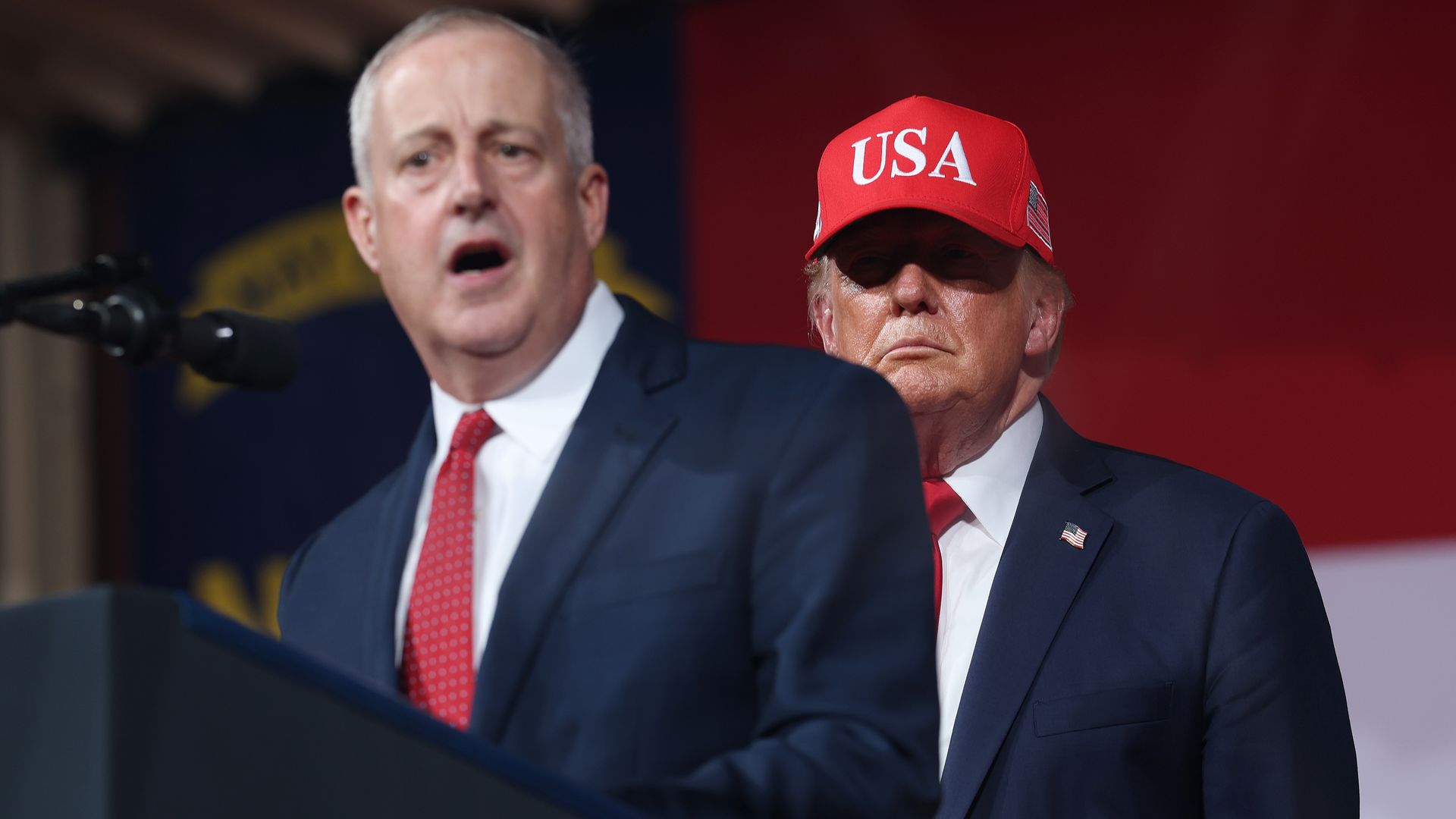Trump and Whatley on stage