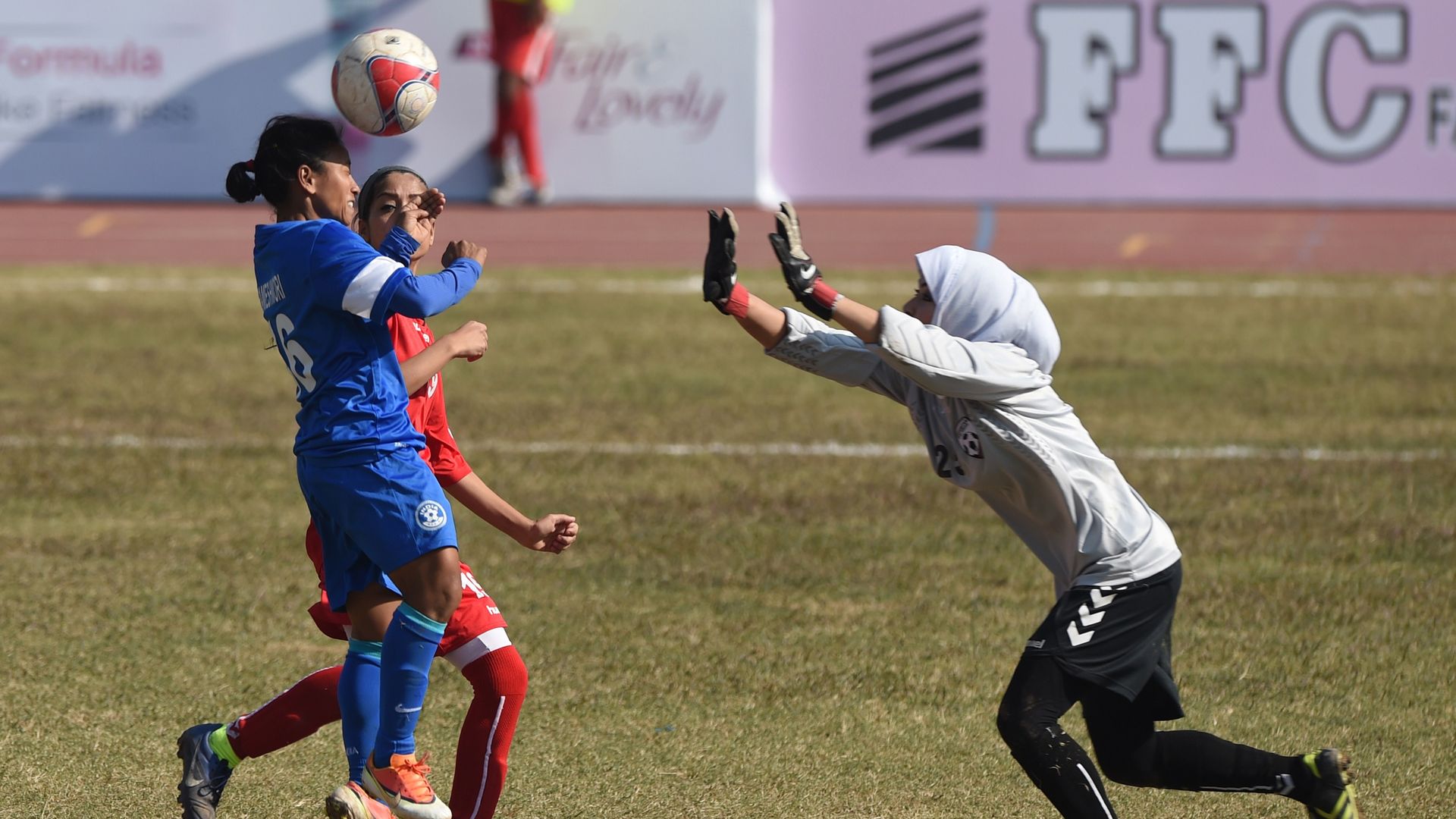 India plays Afghanistan in in the 3rd South Asian Football Federation (SAFF) women's football championship at the Jinnah Stadium in Islamabad on November 17, 2014. 