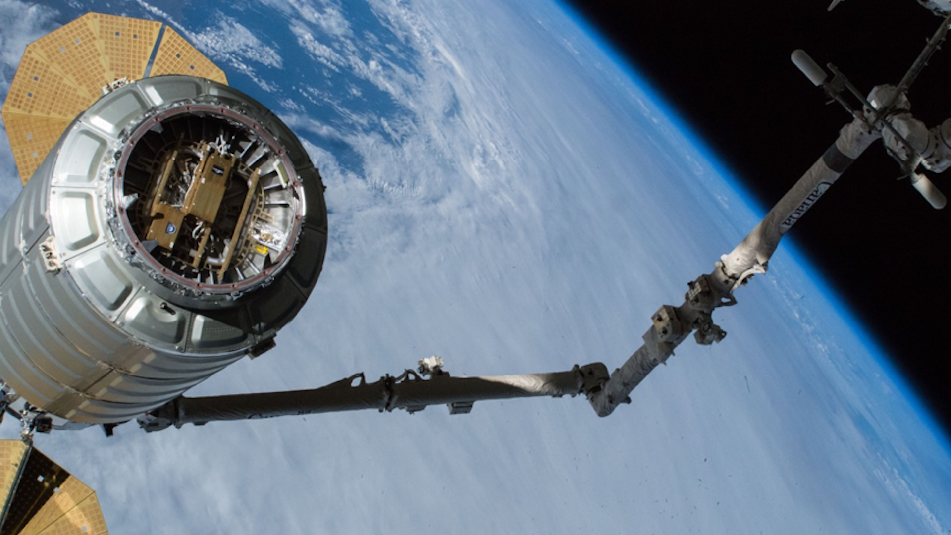 Cygnus spacecraft as it is leaving the International Space Station with UbiquitiLink's payload attached
