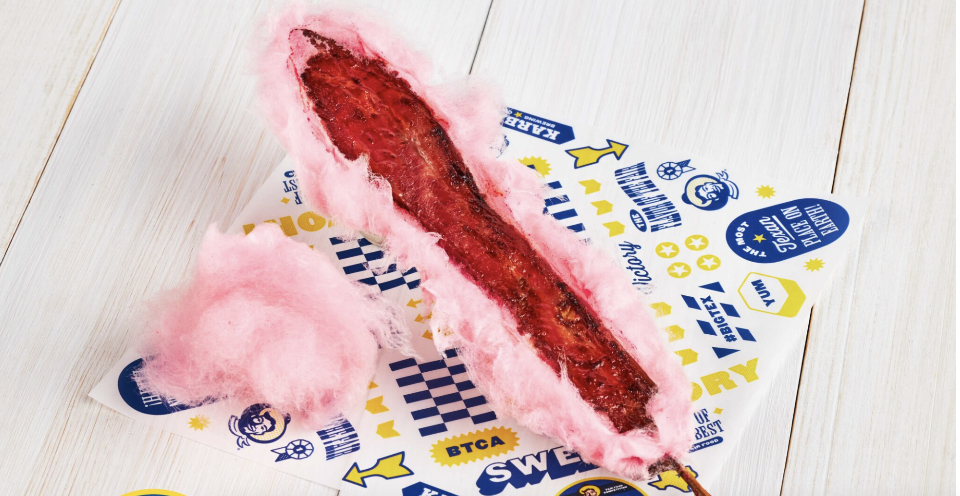 A slice of bacon, fried, then enveloped in cotton candy