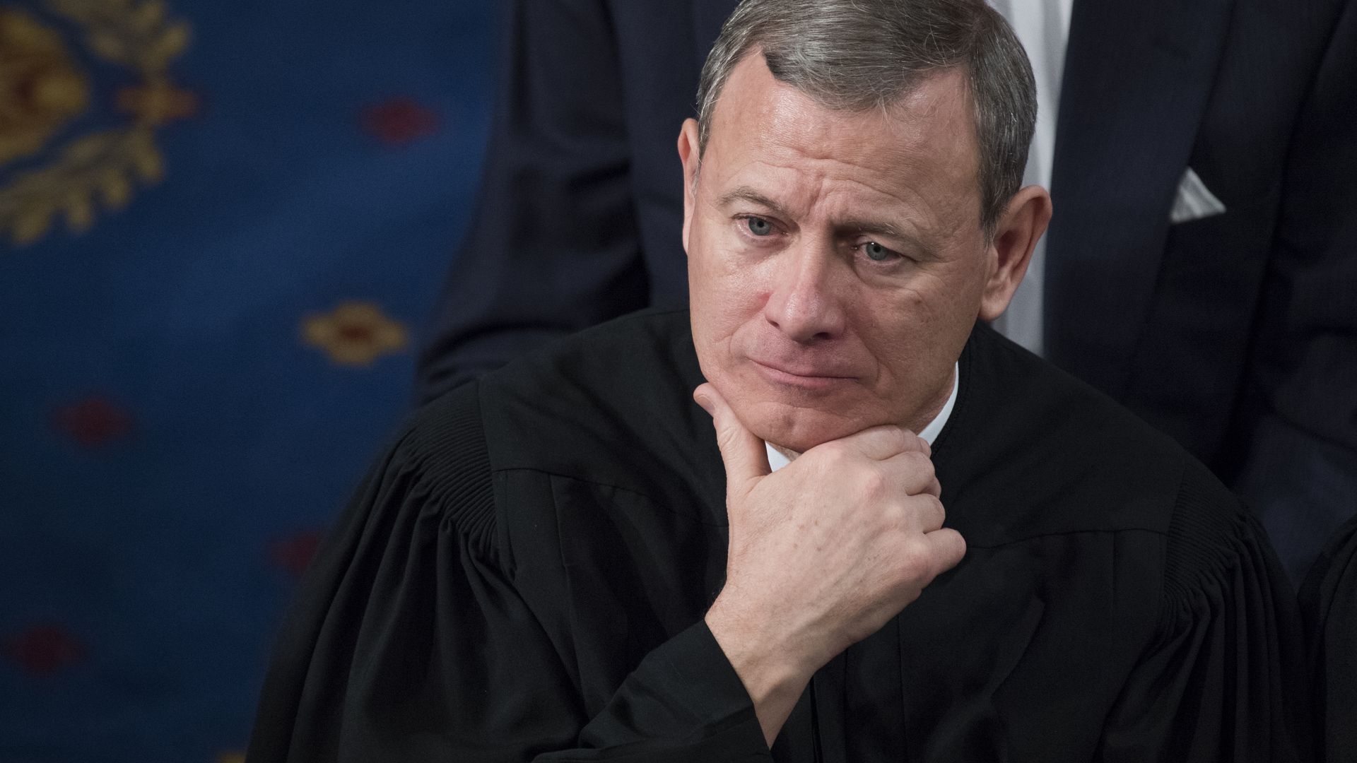 Supreme Court Chief Justice John Roberts listens to President Donald Trump's State of the Union address to a joint session of Congress on January 30