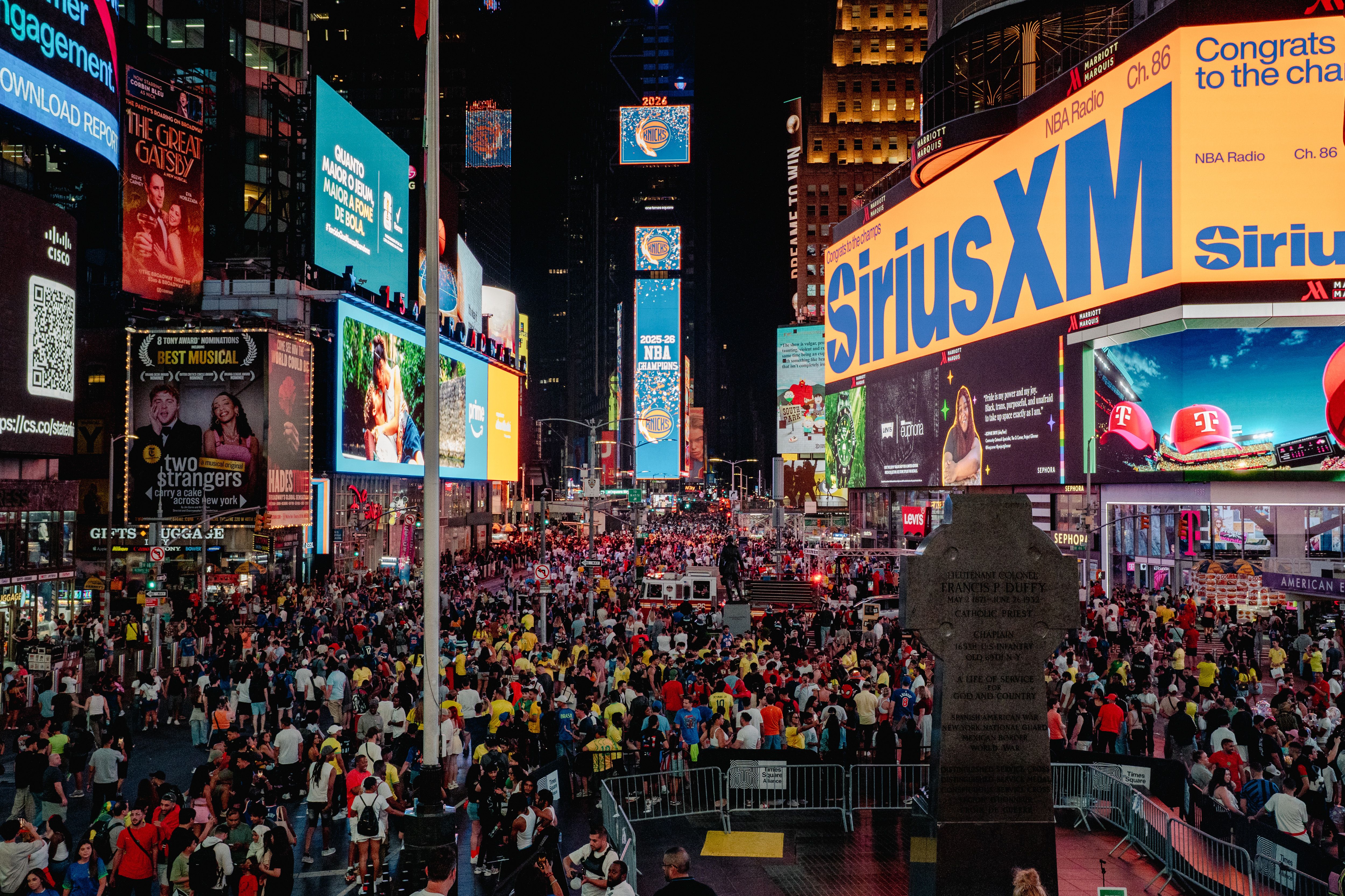 New York Knicks fans fill Times Square in Manhattan after their team won the NBA Championship, on Saturday, June 13, 2026. (Shuran Huang/The New York Times)