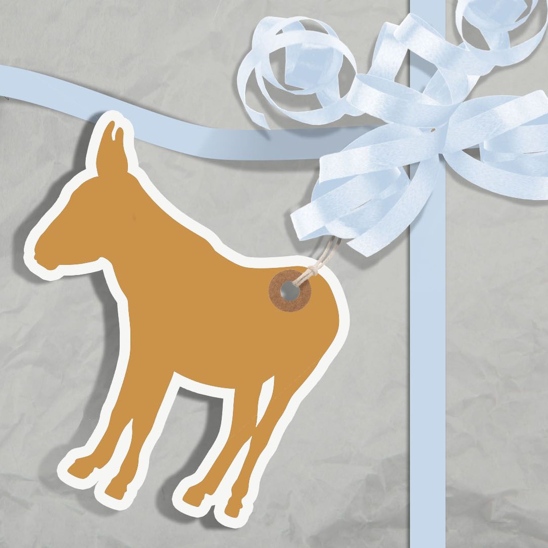 Illustration of a partially unwrapped gift with a donkey greeting card attached