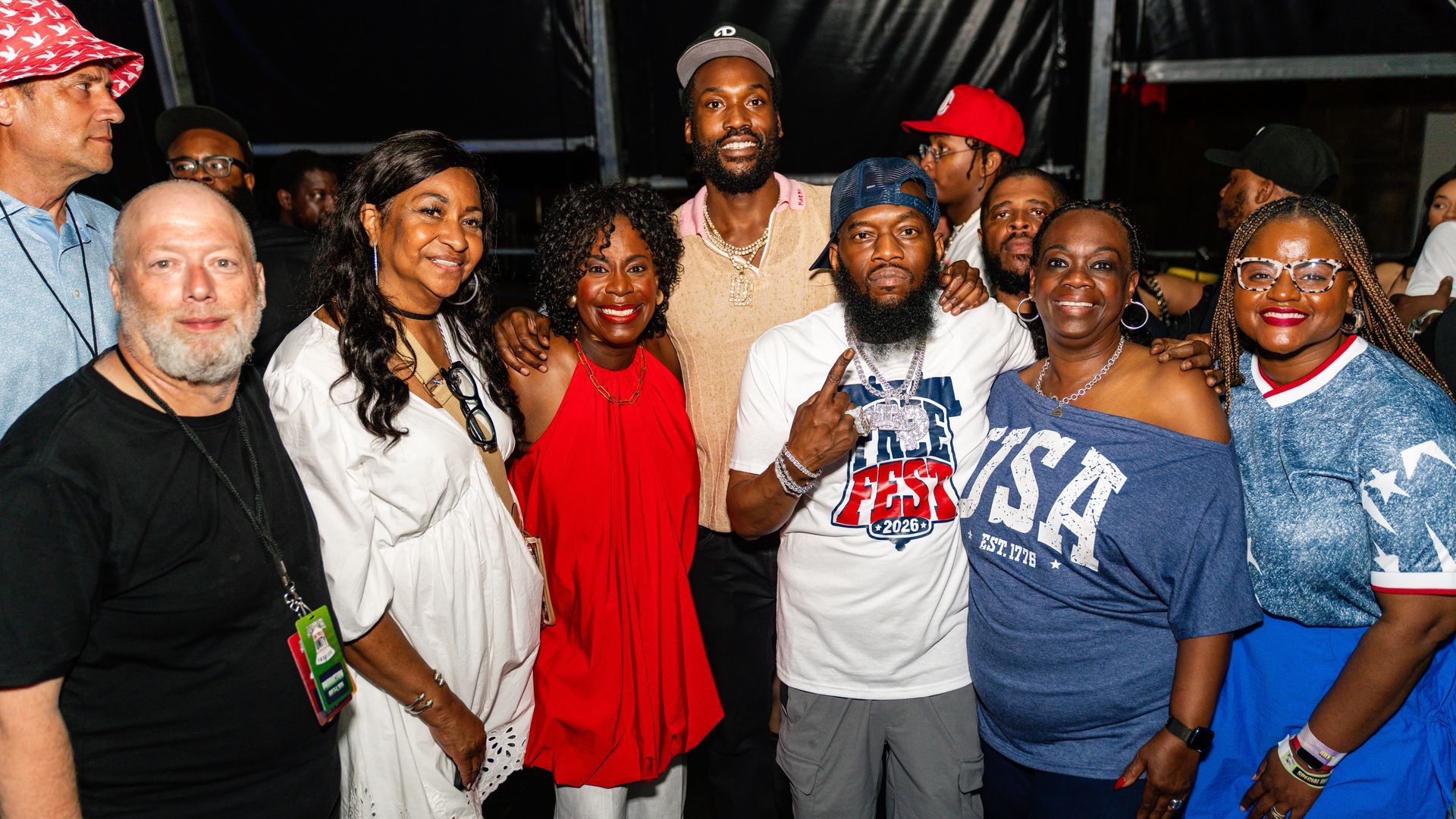 Left to right: ESM Productions co-owner Scott Mirkin, standing with several people, including Mayor Cherelle Parker, and rapper Meek Mill. 