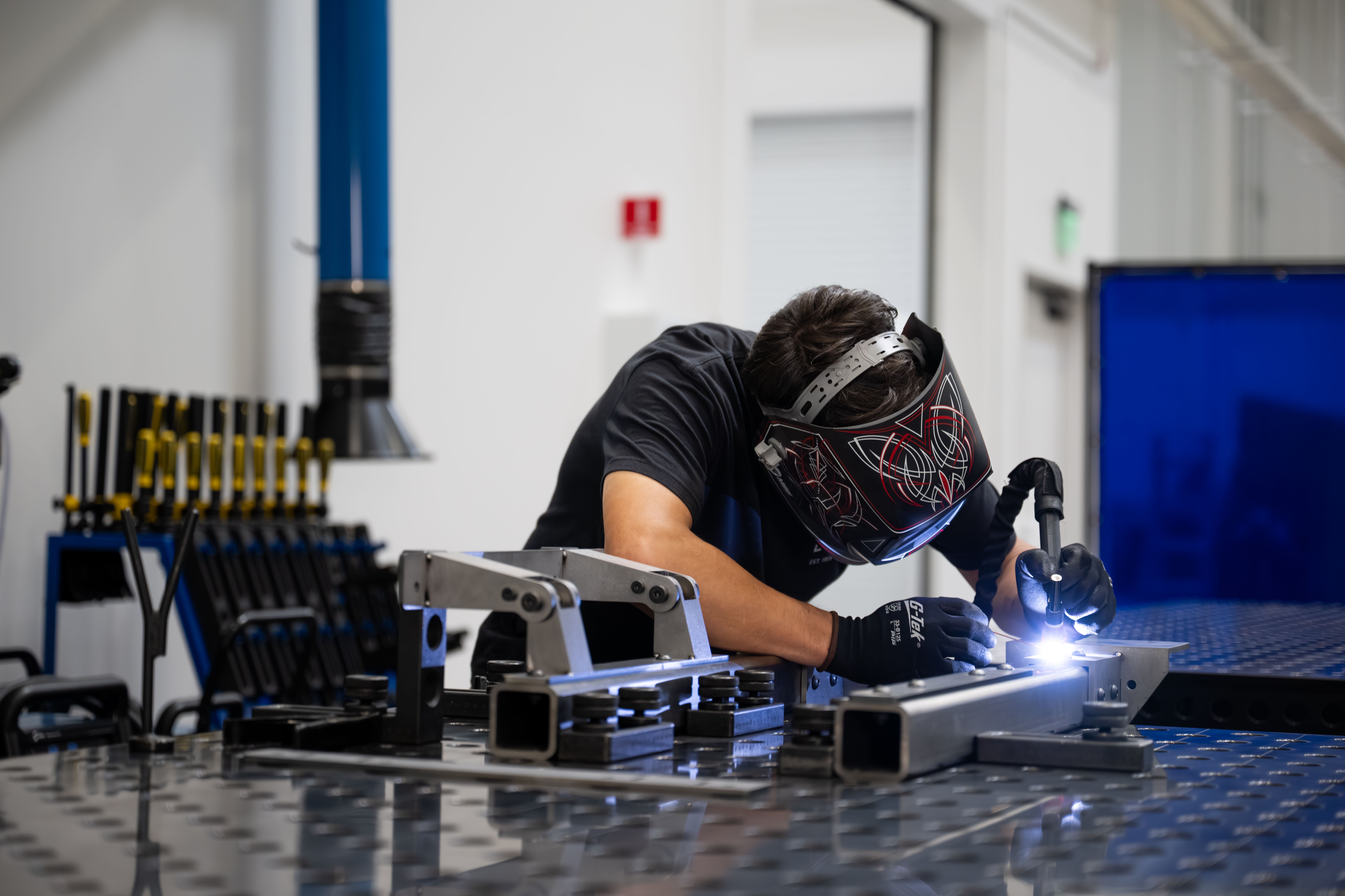 A metal fabrication engineer inside Ford's Electric Vehicle Development Center in Long Beach, Calif. 