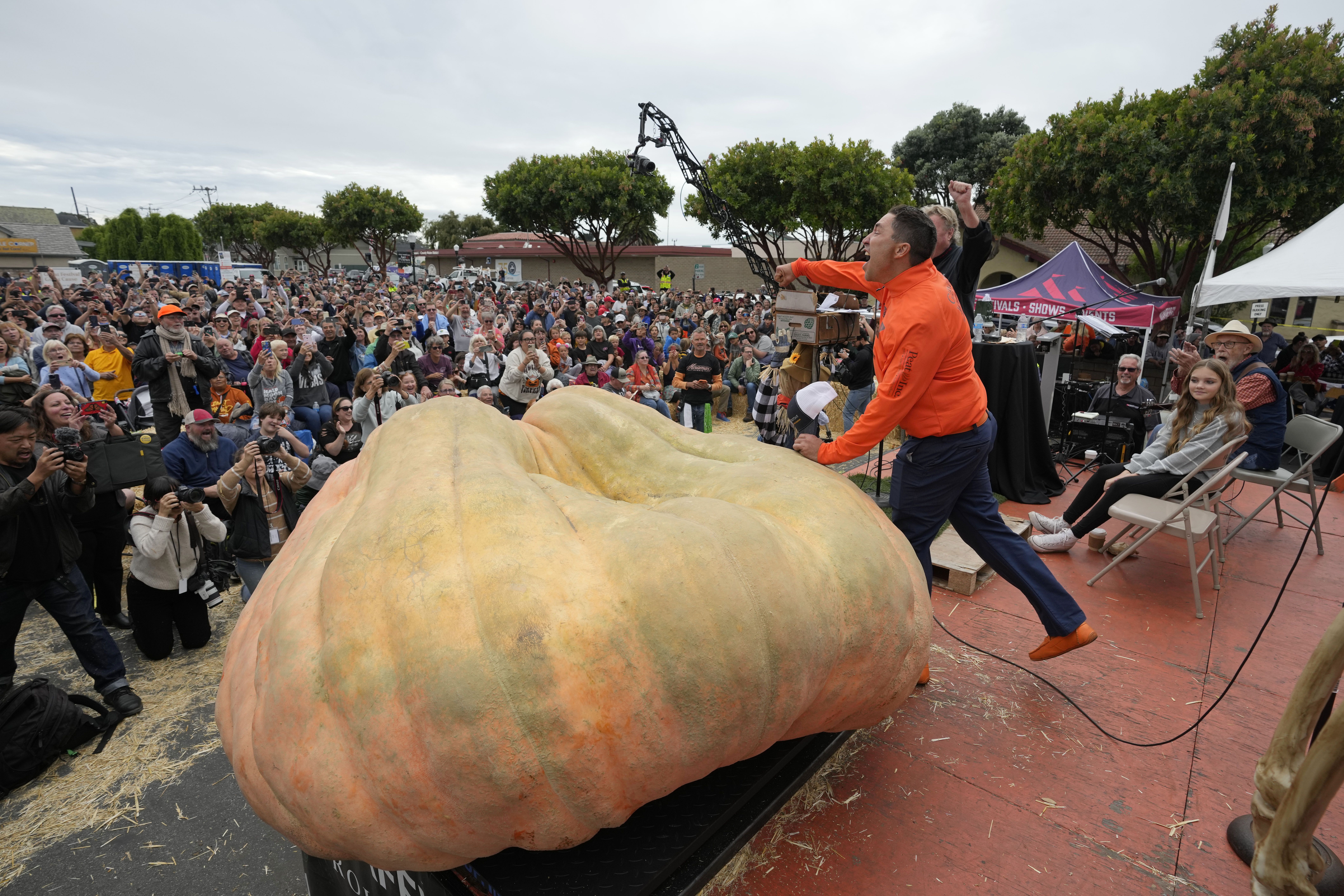 Travis Gienger of Anoka, Minn., reacts after winning the Safeway 50th annual World Championship Pumpkin Weigh-Off in Half Moon Bay, Calif., Monday, Oct. 9, 2023.