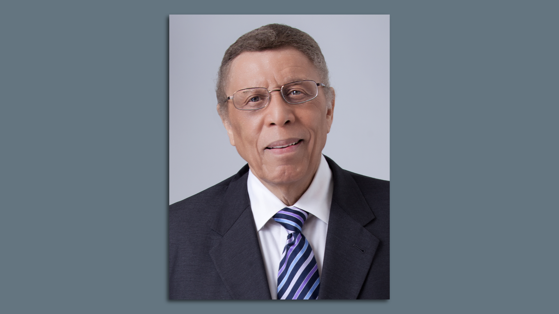 Photo of a man in a suit