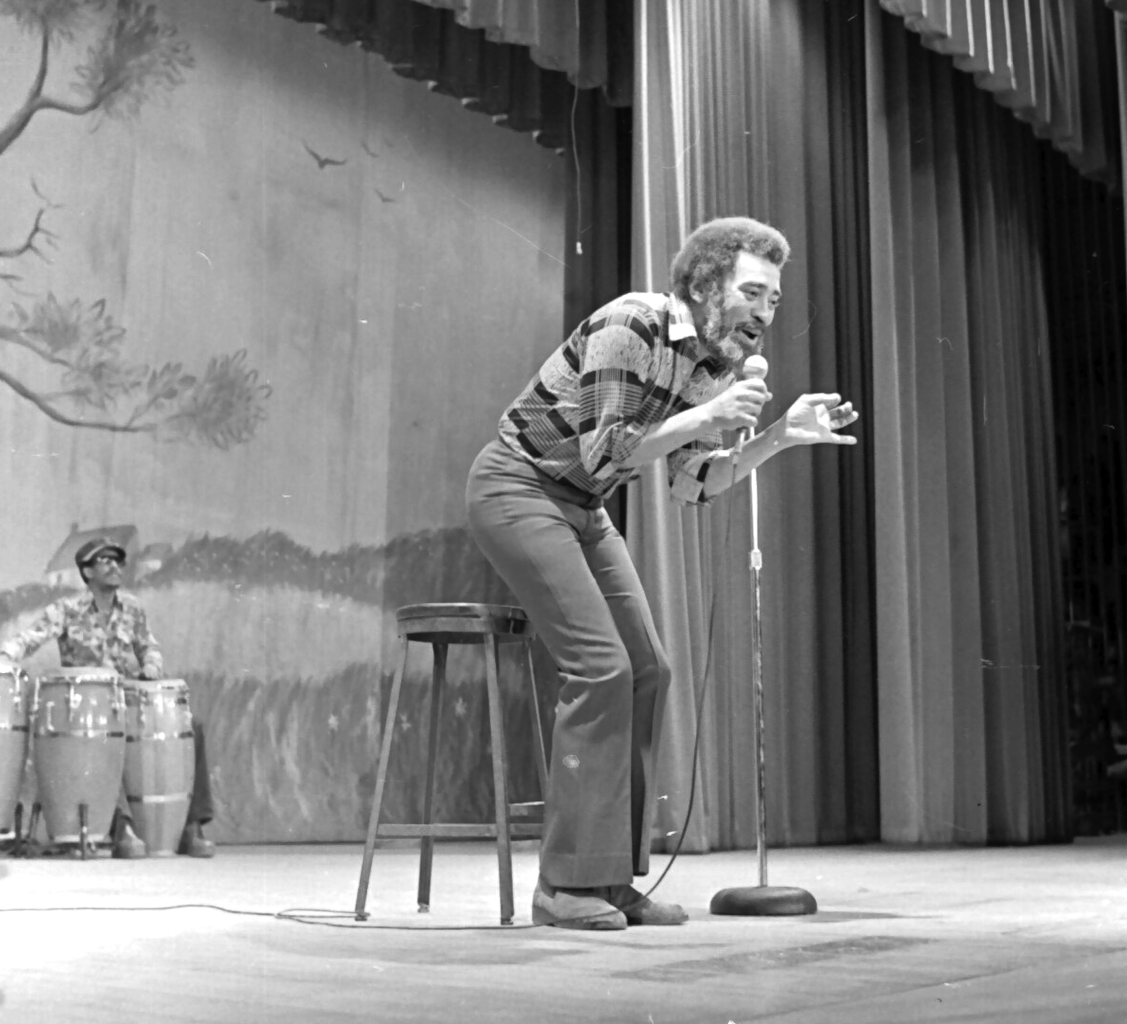 Photo of a perfomer on stage 