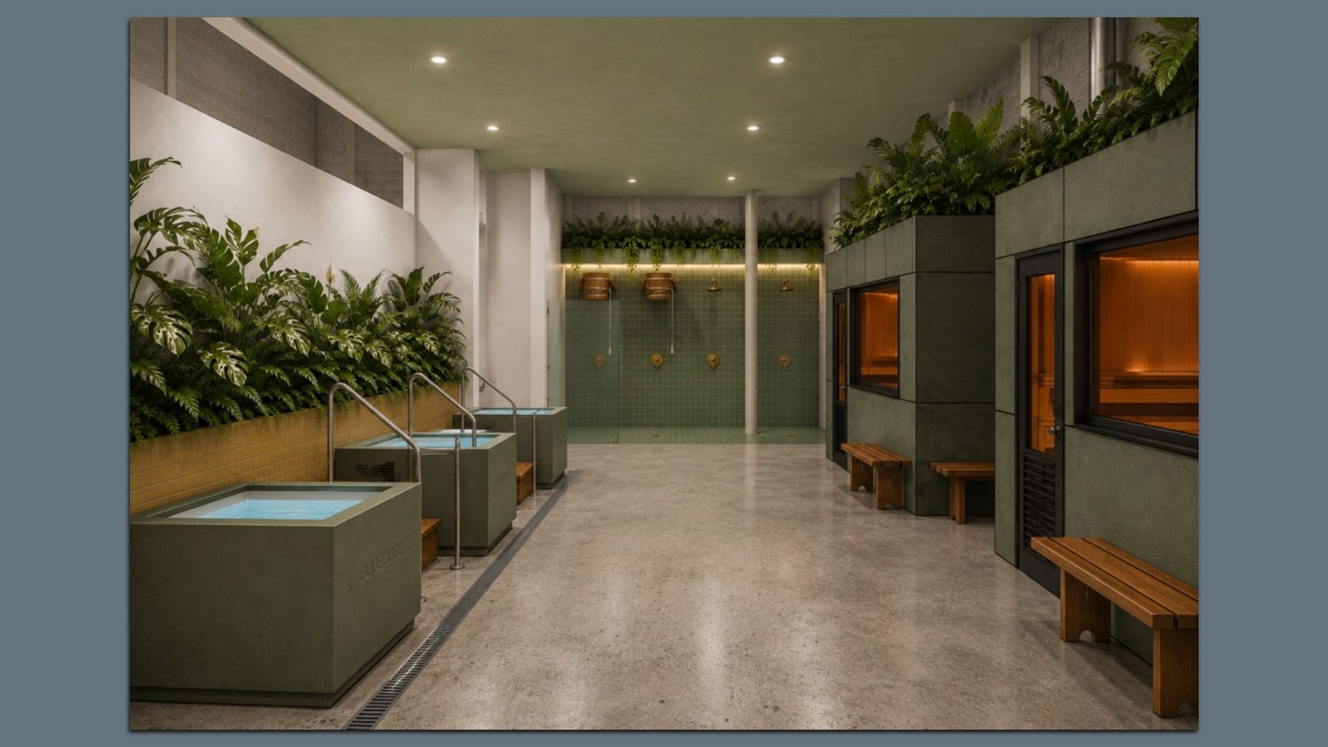 Indoor spa space with a green-tiled back wall and multiple showers, three rectangular basins on the left, lush tropical plants along a white wall, and gray cubicles with wooden benches on the right.