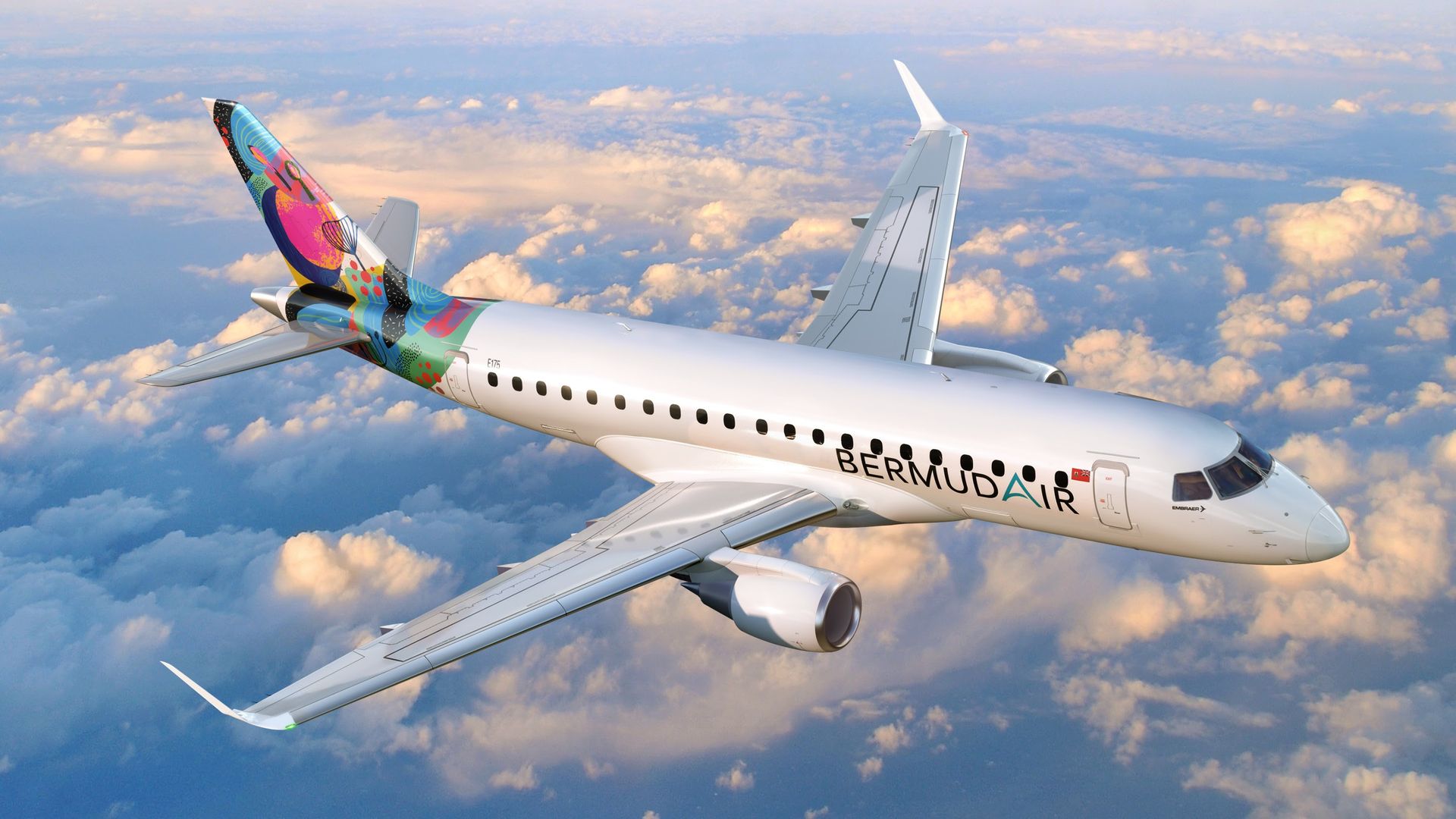 Side view of a Bermuda Air jet flying above clouds, white fuselage with vivid, multicolored tail art. Engines under wings, clear blue sky with soft orange clouds.