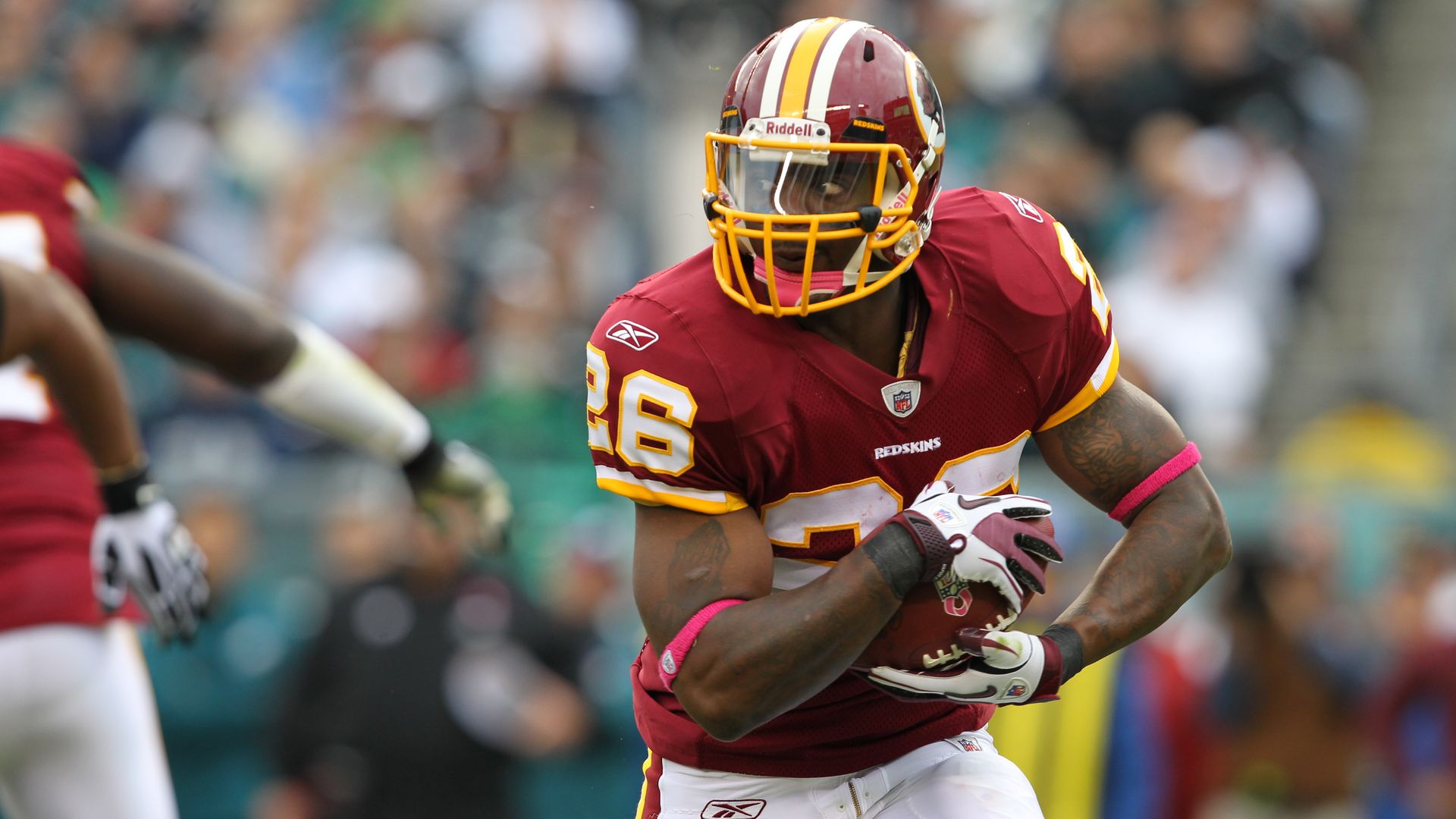 Running back Clinton Portis #26 of the Washington Redskins carries the ball during a game against the Philadelphia Eagles on October 3, 2010