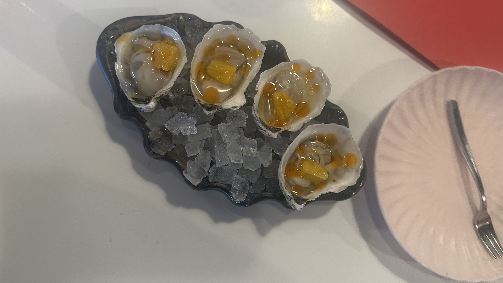 Raw oysters on a bed of ice 