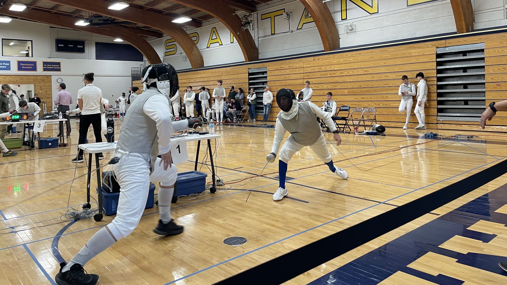 two fencers