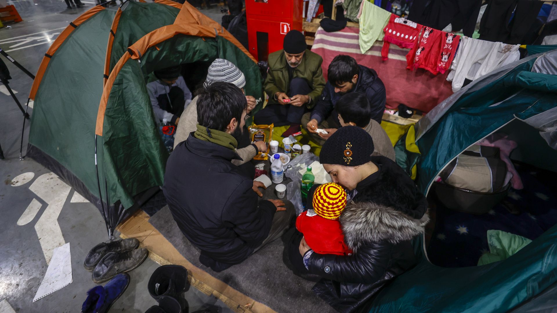 Migrants continue to wait at a closed area allocated by Belarusian government the Belarusian-Polish border in Grodno, Belarus on December 01, 2021.