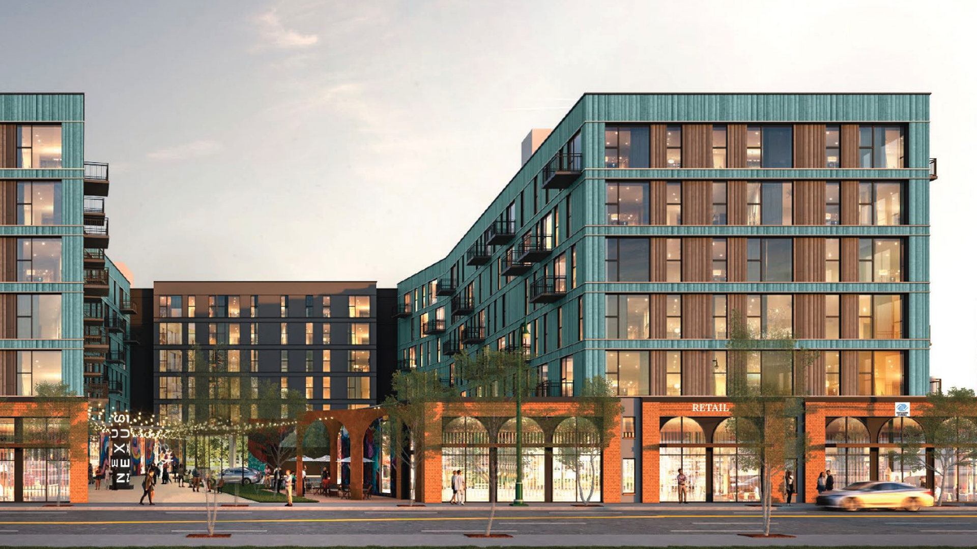 A rendering of a contemporary urban complex: two teal-brick, glass-fronted residential buildings flanking a central dark glass connector, with ground-floor brick storefronts, trees, people, and cars along a street.