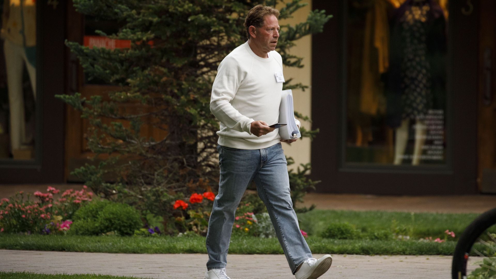 Bobby Kotick walking down sidewalk