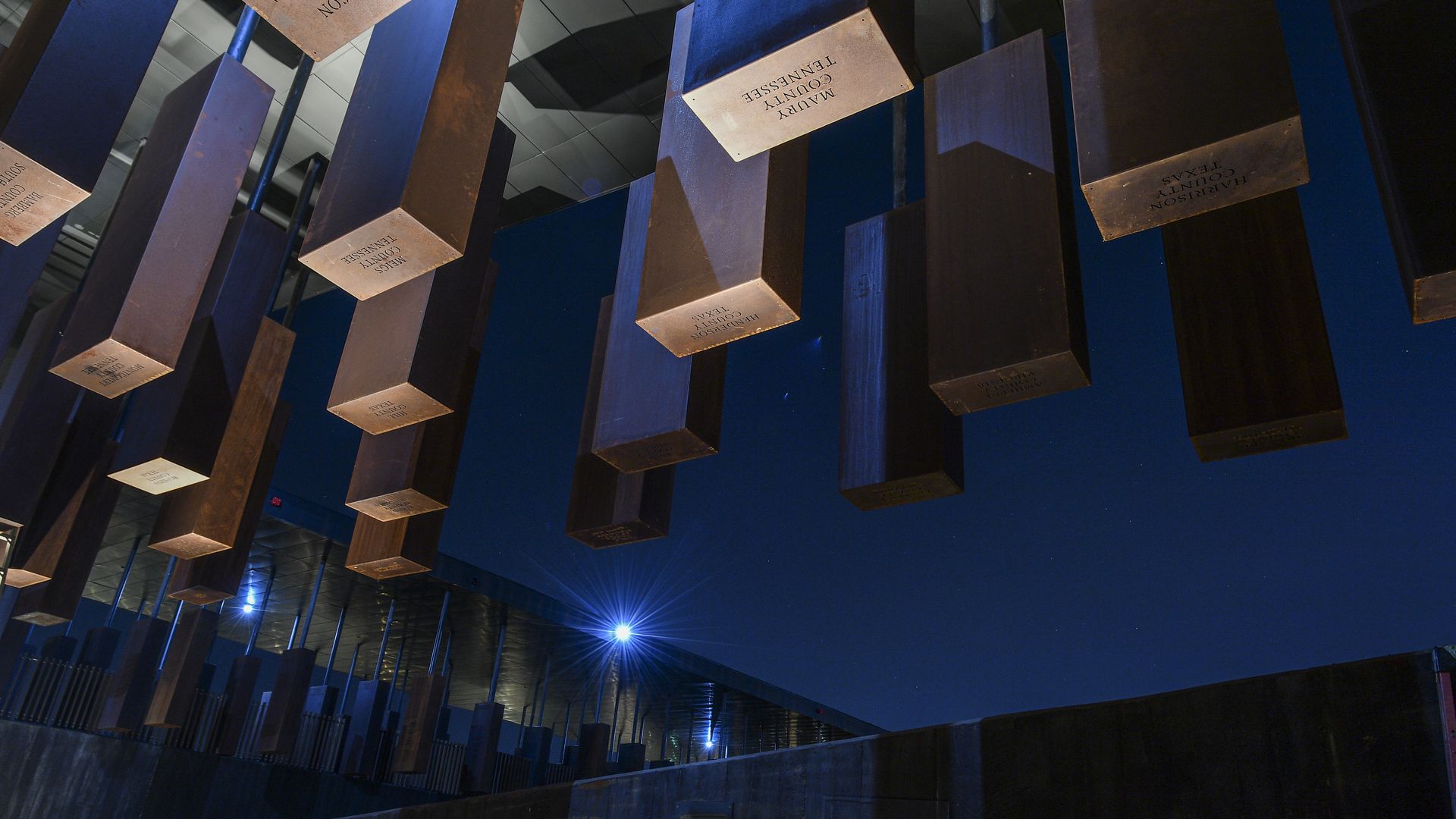 Stones hanging from the ceiling at lynching memorial
