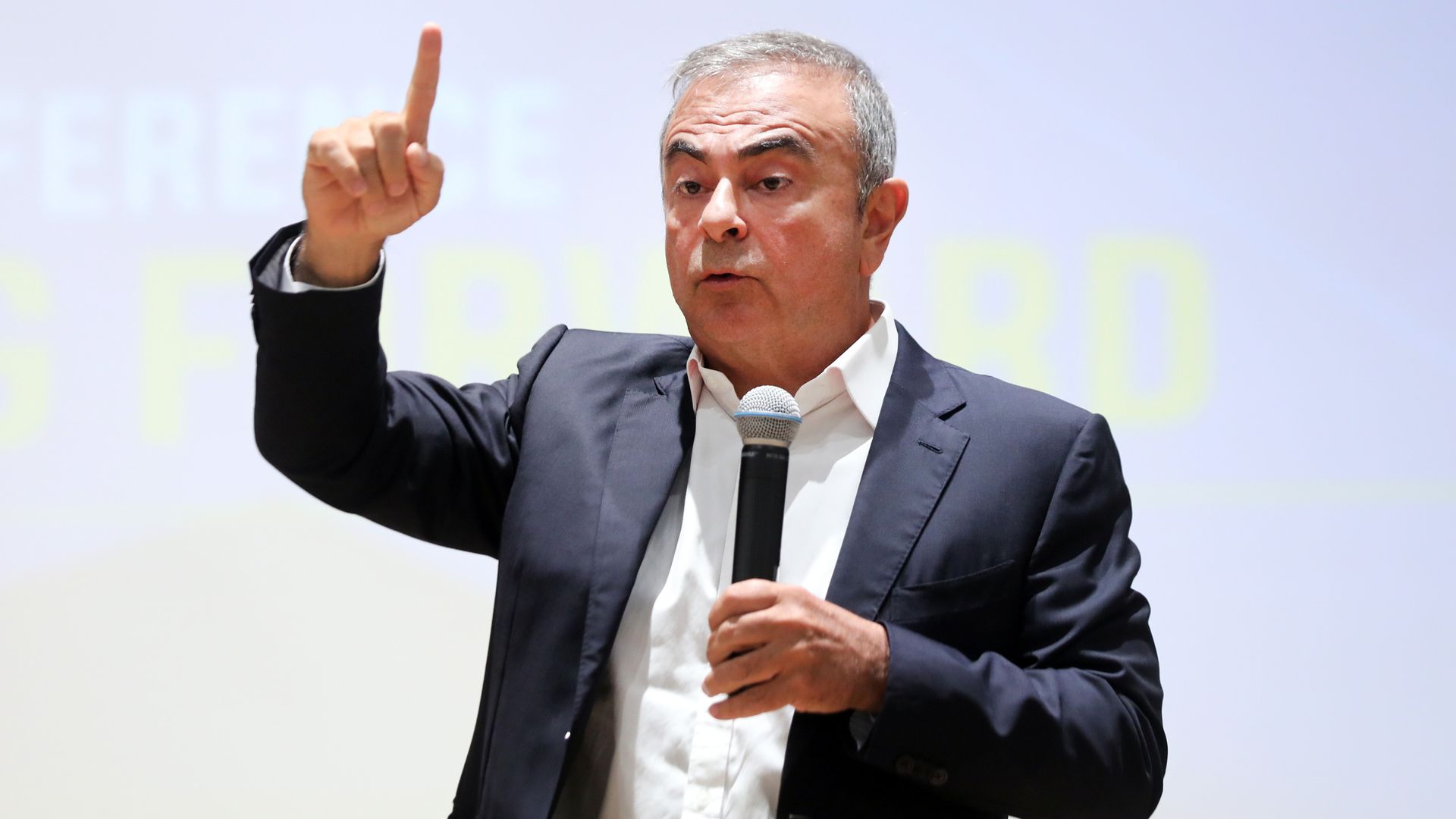 Carlos Ghosn, former Nissan chief executive officer, center,  during a news conference at the Holy Spirit University of Kaslik (USEK) in Jounieh, Lebanon, on Tuesday, Sept. 29, 2020. 