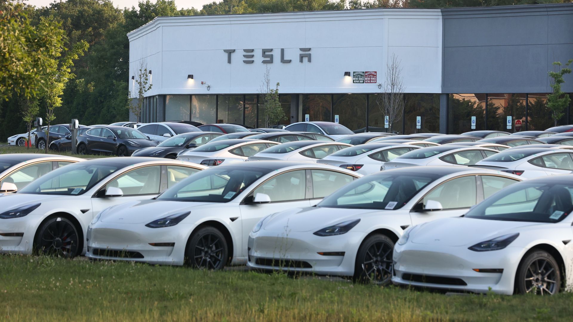 Tesla vehicles outside of a store in Smithtown, New York, in July 2023.