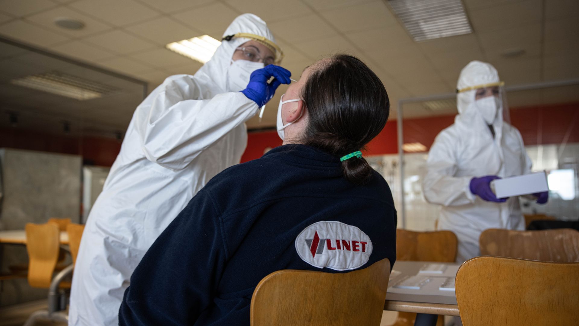 A healthcare worker administering a coronavirus test on a person in Slany, Czech Republic, on March 5.