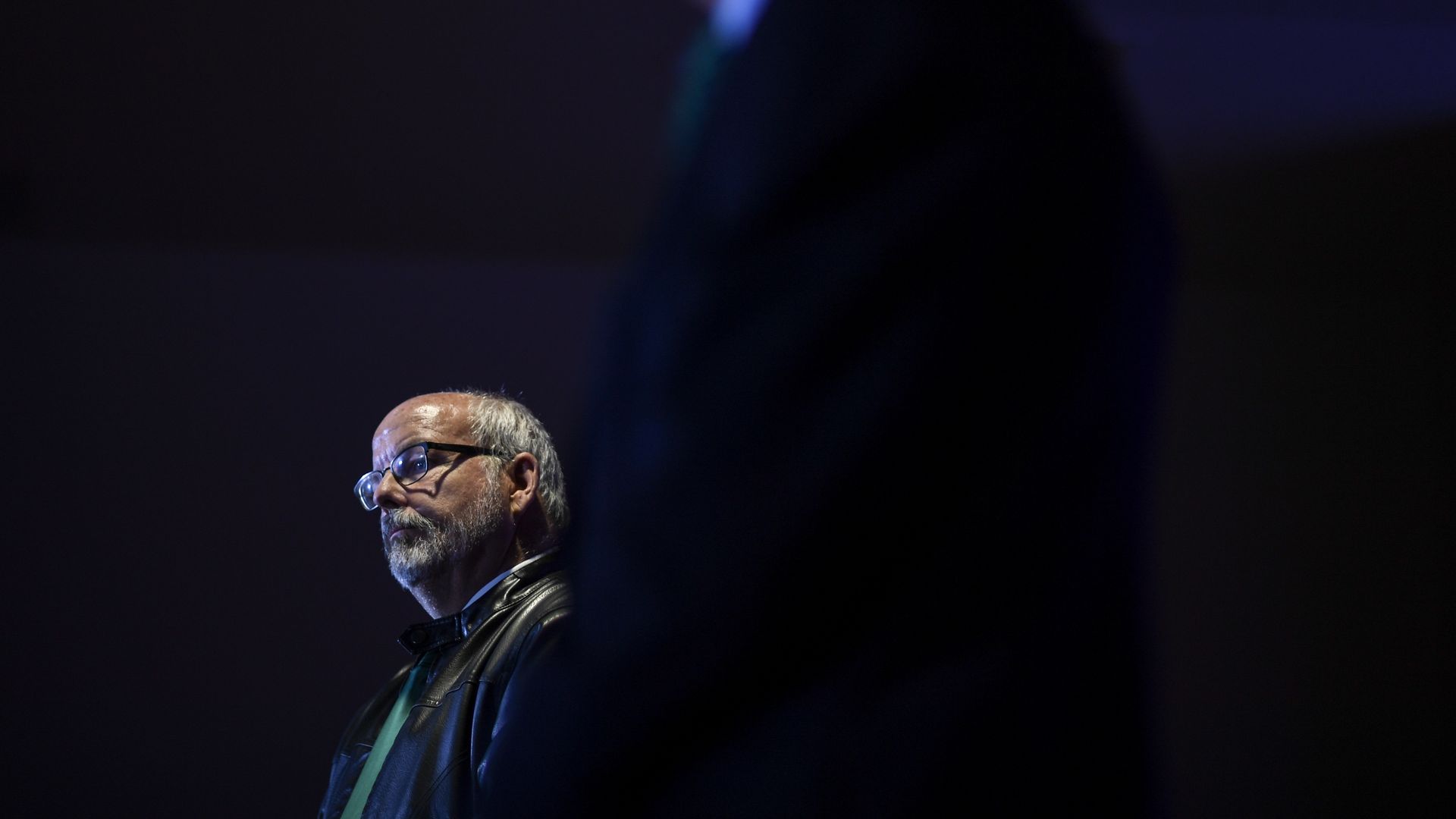 Colorado State Rep. Tom Sullivan (left) listens during a community forum on gun violence on Thursday, December 5, 2019. 