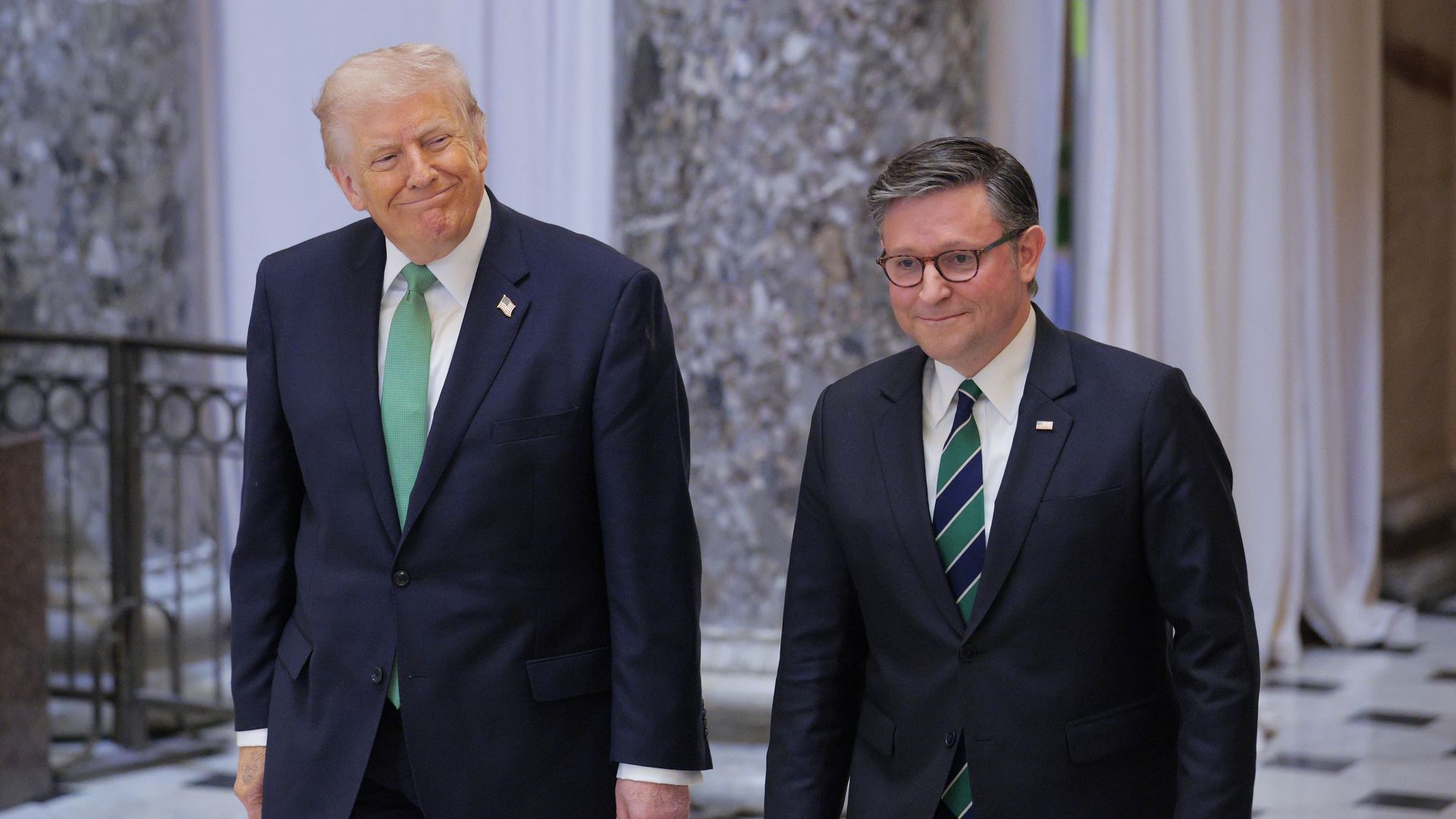 President Trump and House Speaker Mike Johnson depart the annual Friends of Ireland Luncheon in Statuary Hall at the U.S. Capitol on March 17. 