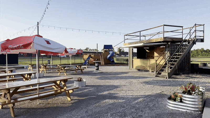 image shows outdoor dining and picnic tables
