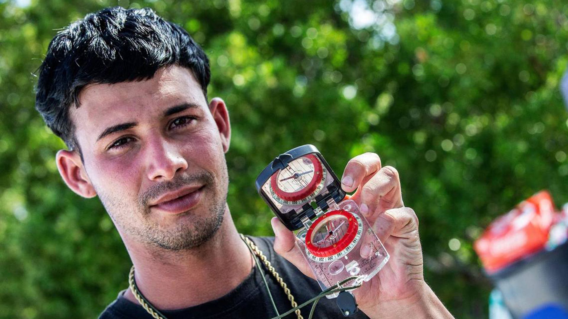 Cuban migrant Jorge Yunier Cepa Sanchez displays the compass he used to lead one of two groups of Cuban migrants to the Florida Keys