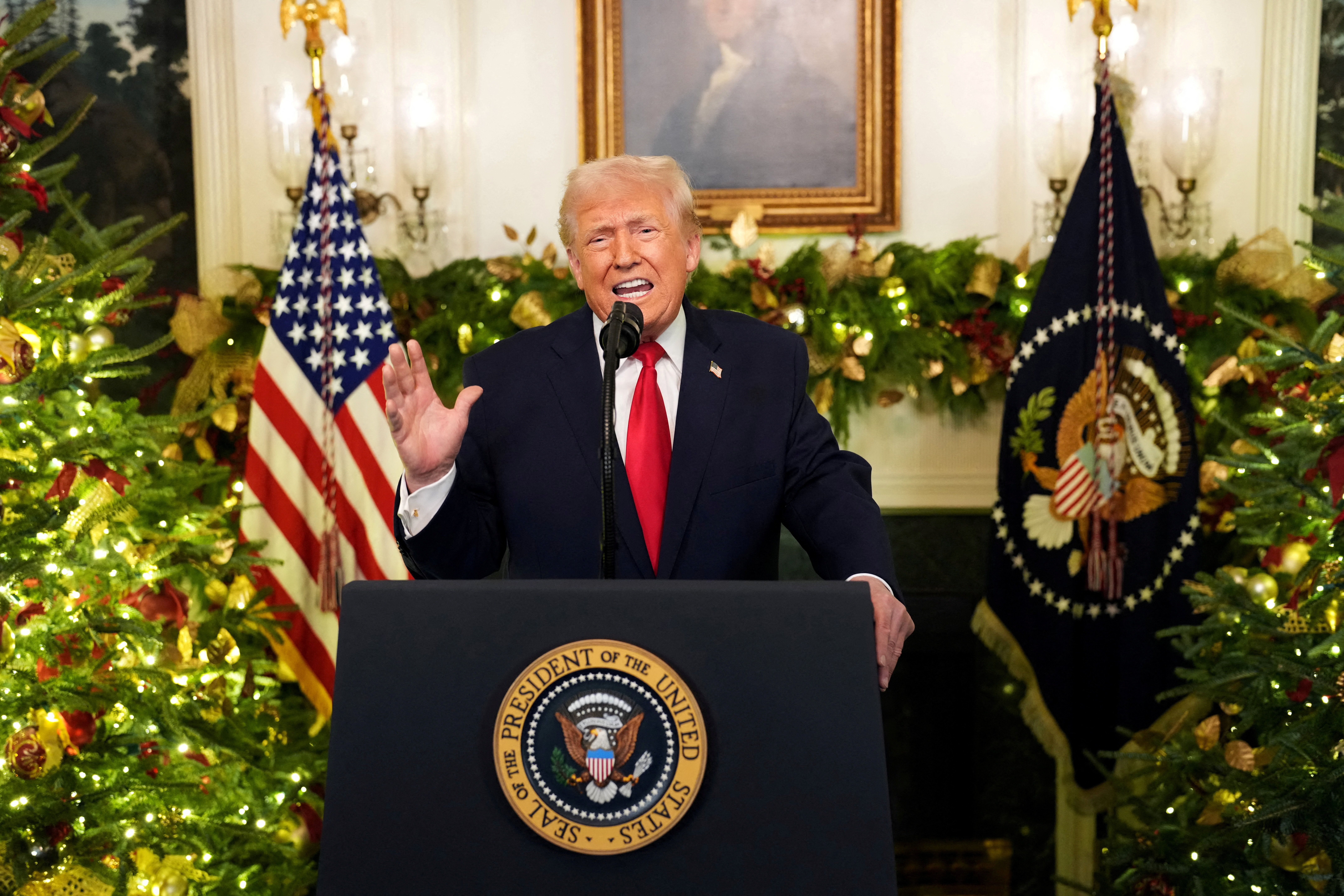 President Trump delivers a televised address from the Diplomatic Reception Room in the White House last night. Photo: Doug Mills/The New York Times