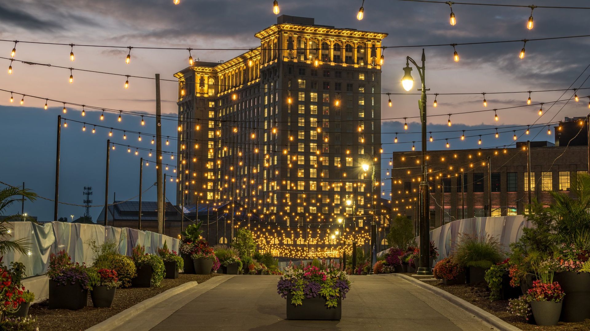 The station lit up at dusk.