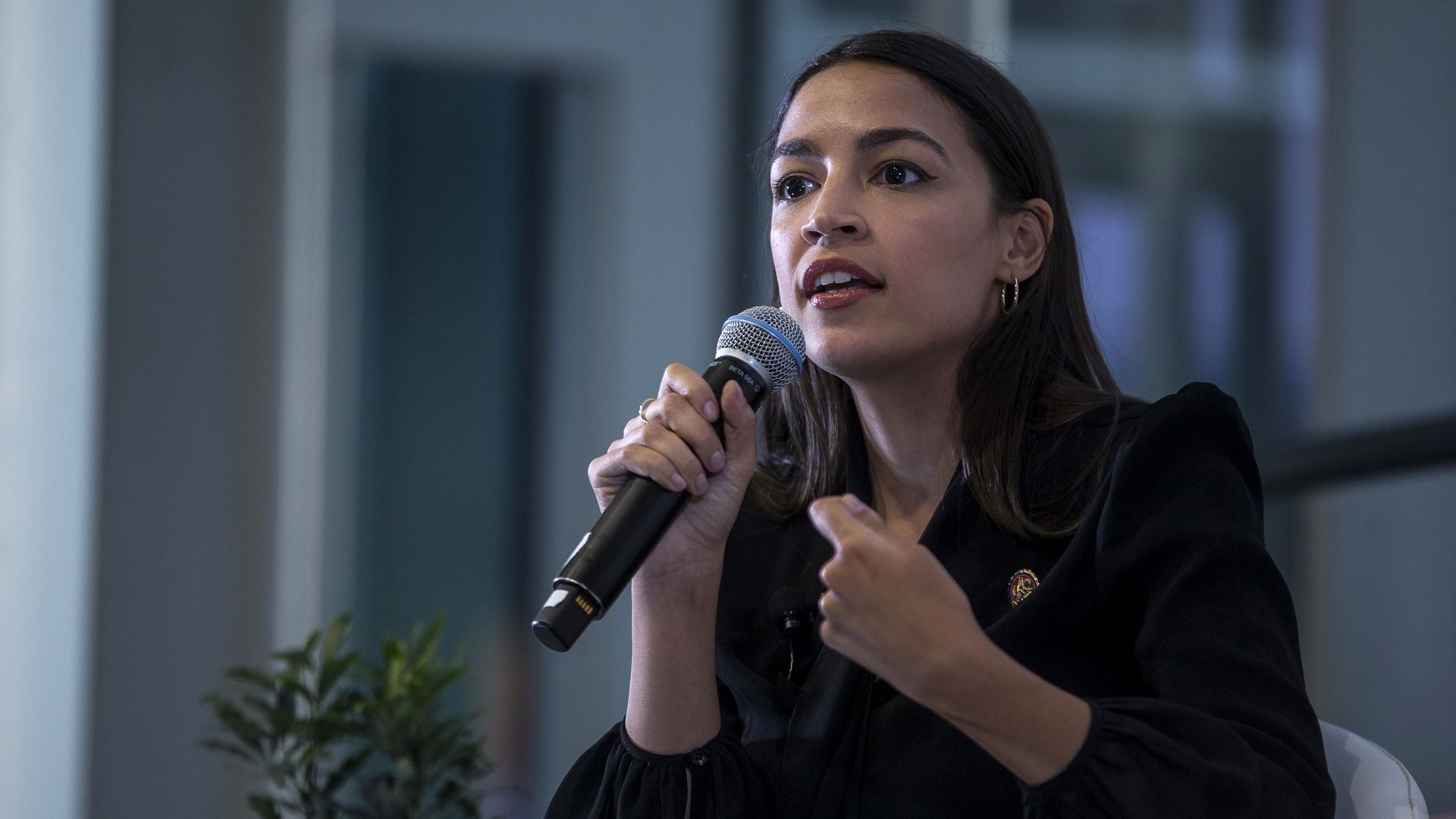 Rep. Alexandria Ocasio-Cortez speaking at an event
