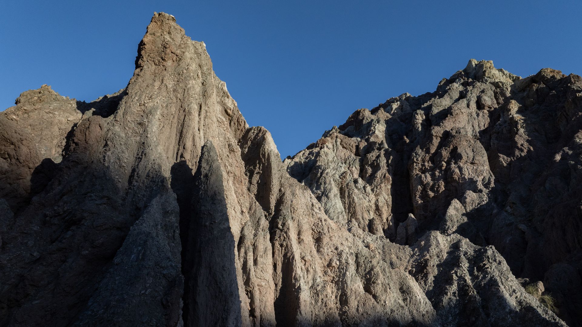 Photo of rock formations that create a mountain range