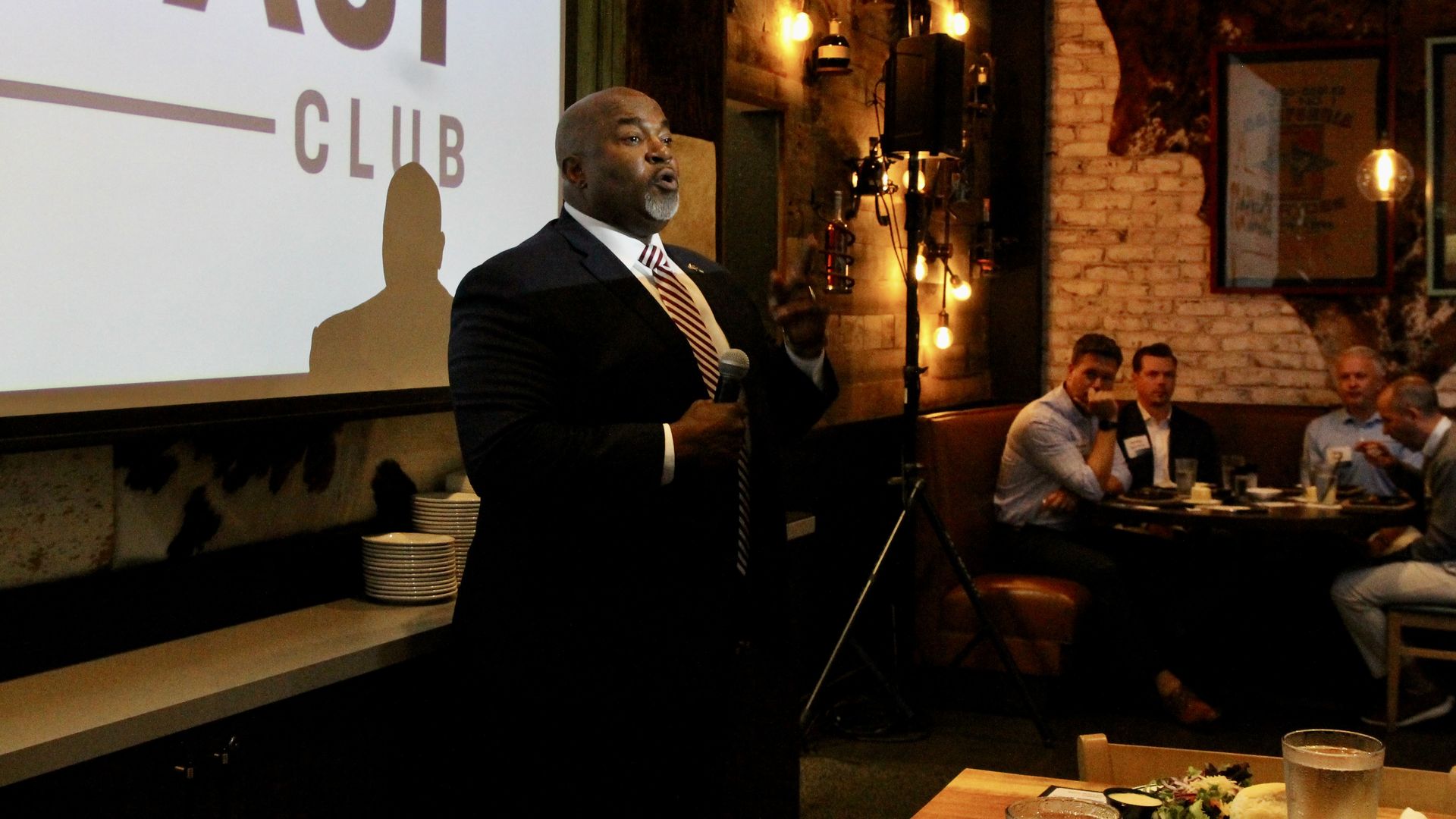 Mark Robinson speaks inside restaurant