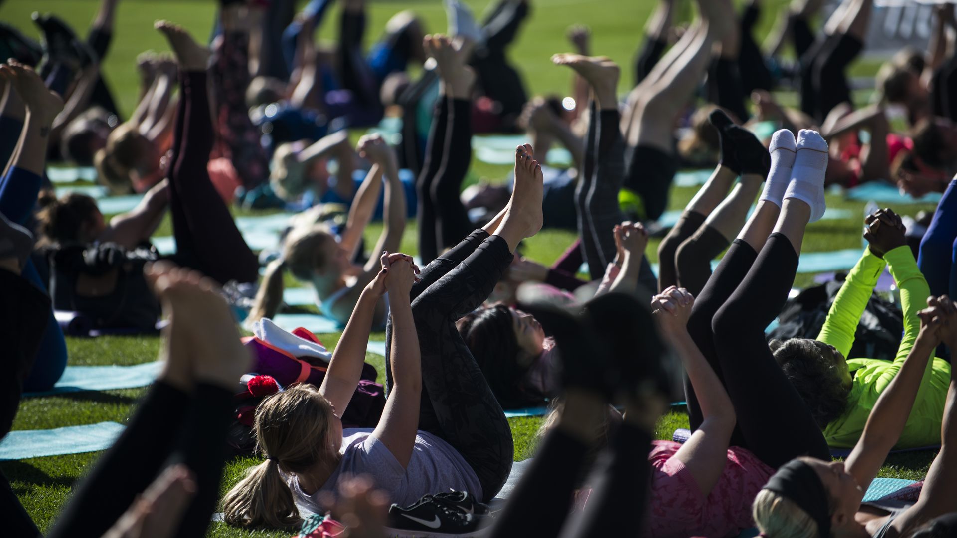 A general view of a bootcamp and yoga workout as Fitbit Local Minneapolis launches at with a free event at Target Field