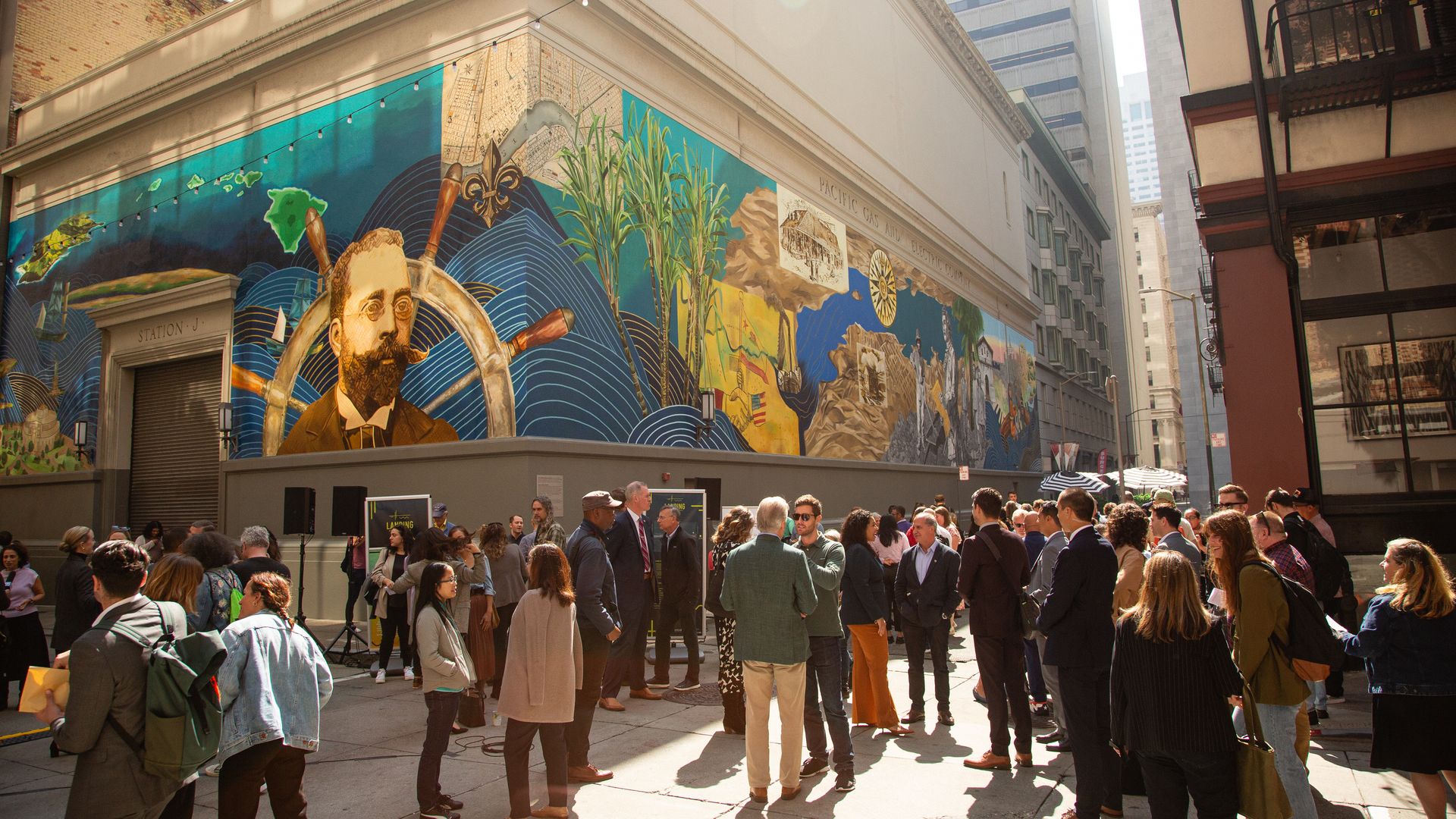 Photo of people mingling and chatting with each other in an outdoor space