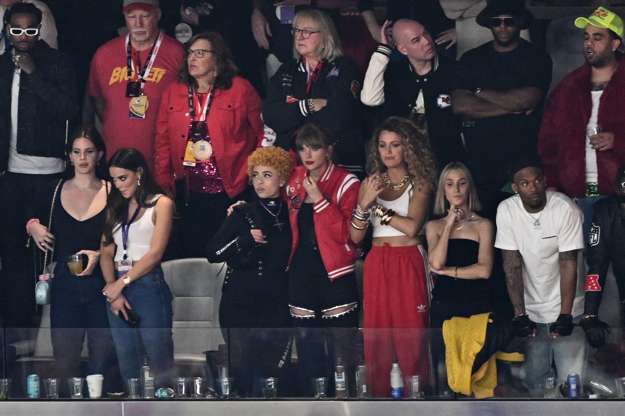 (Bottom row, from 3rd L) US rapper Ice Spice, US singer-songwriter Taylor Swift, US actress Blake Lively, Ashley Avignone and US singer-songwriter Lana Del Rey (bottom L) attend Super Bowl LVIII between the Kansas City Chiefs and the San Francisco 49ers at Allegiant Stadium in Las Vegas, Nevada, February 11, 2024.