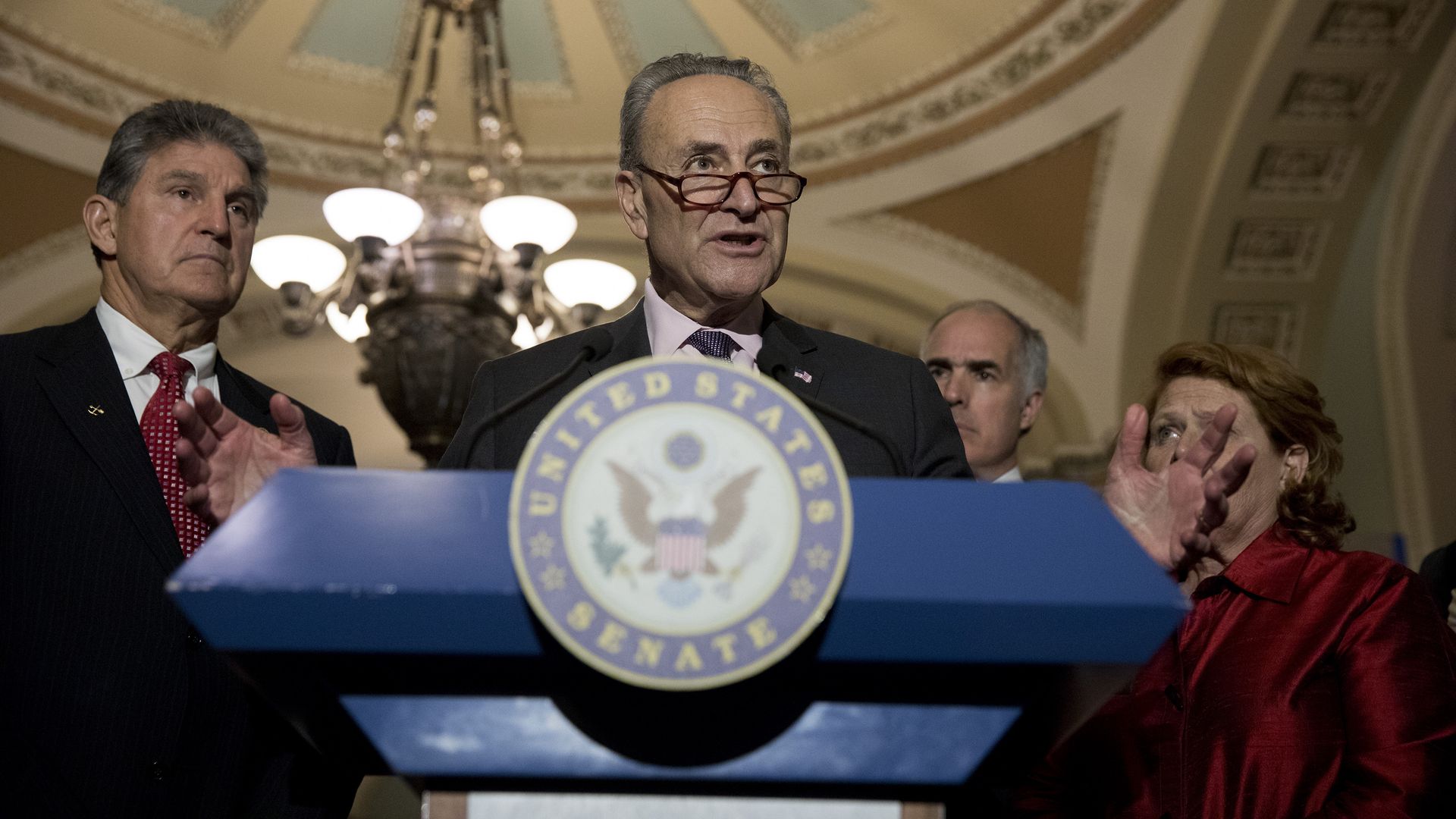 Sen. Joe Manchin is seen with Senate Majority Leader Chuck Schumer.